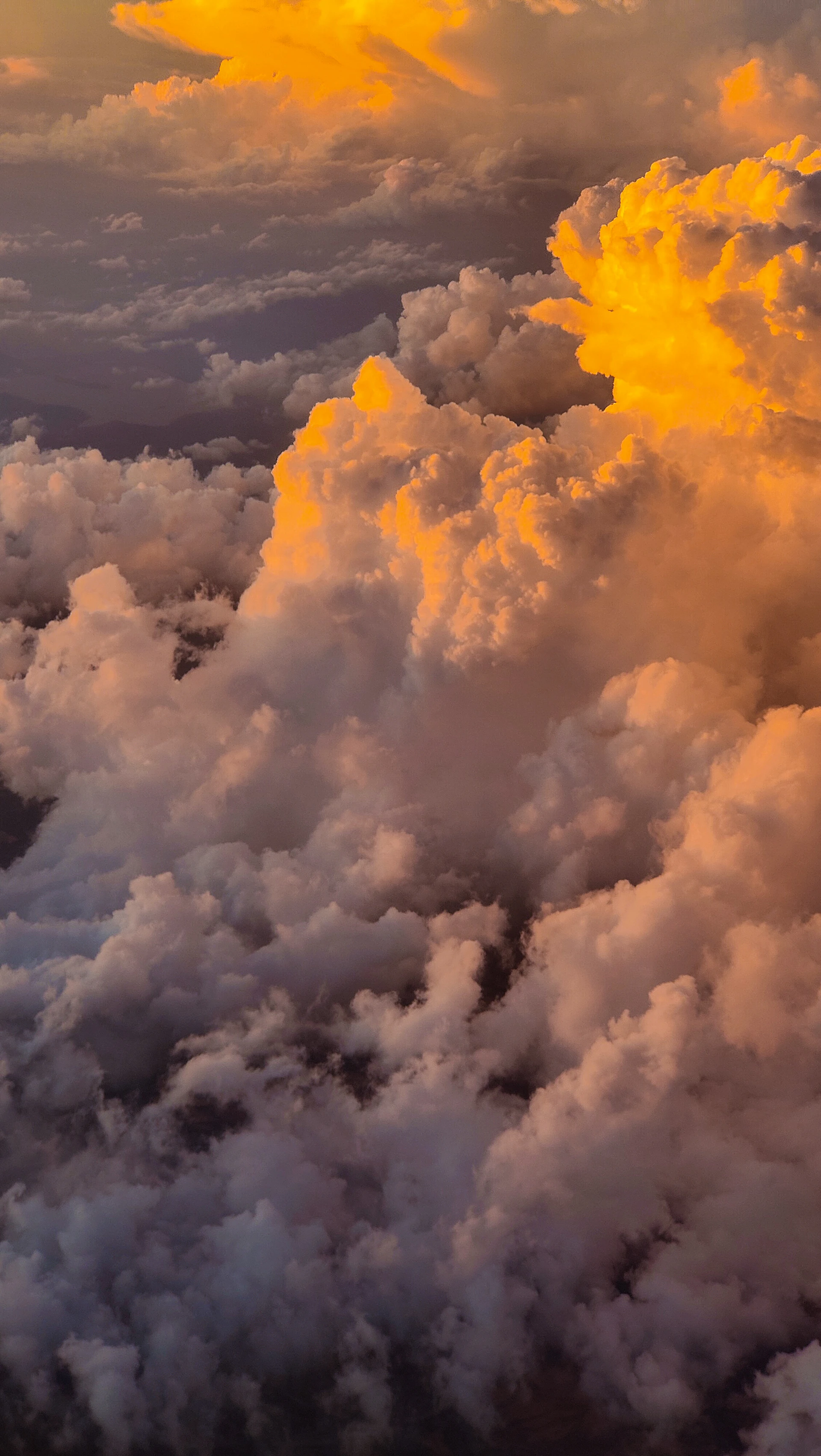 A view of clouds from an airplane window