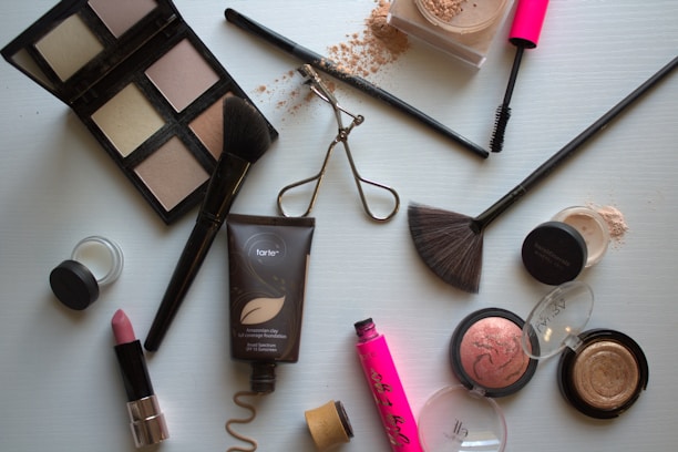 A variety of cosmetics and makeup products on a table