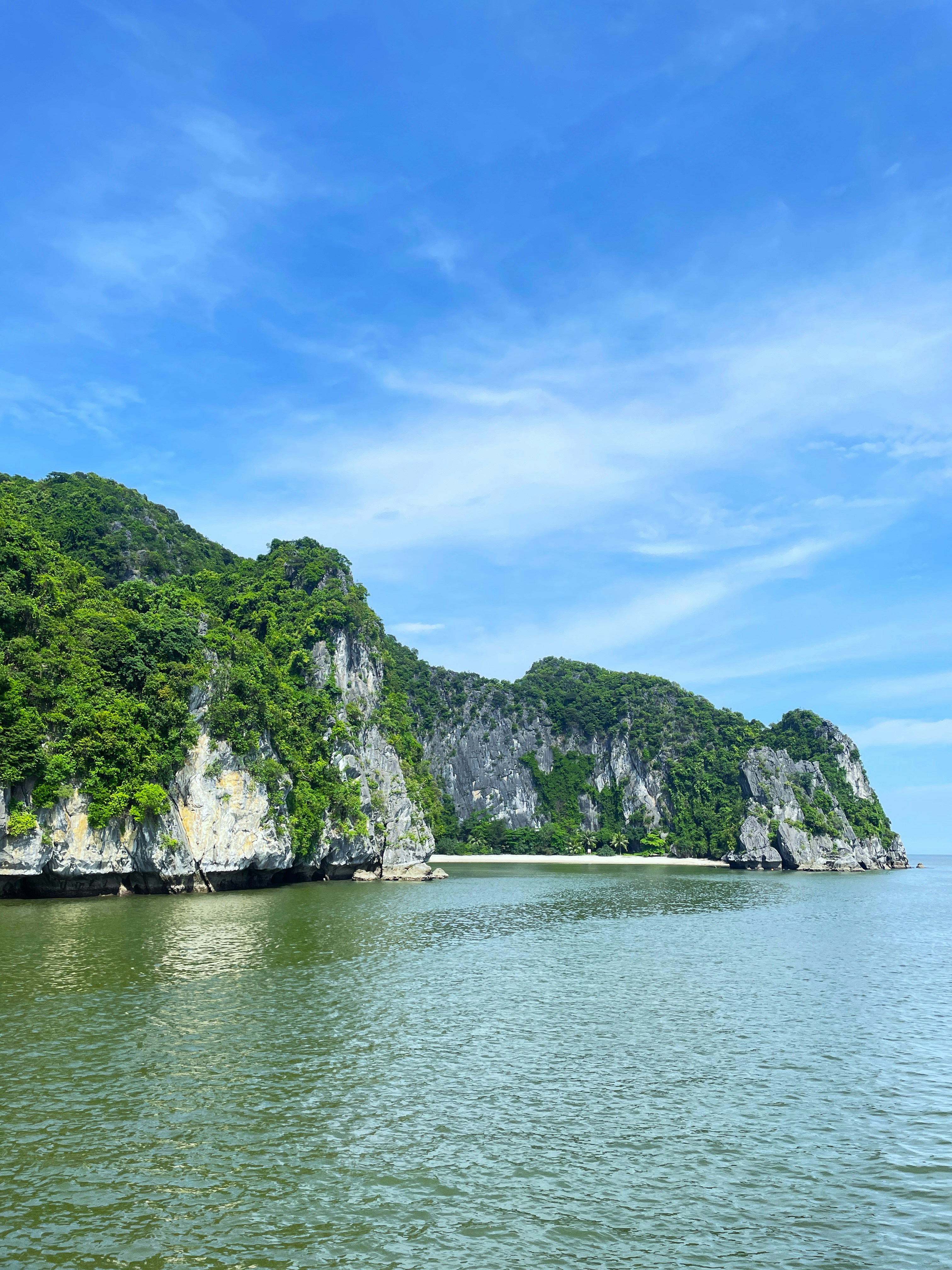 A large body of water surrounded by mountains