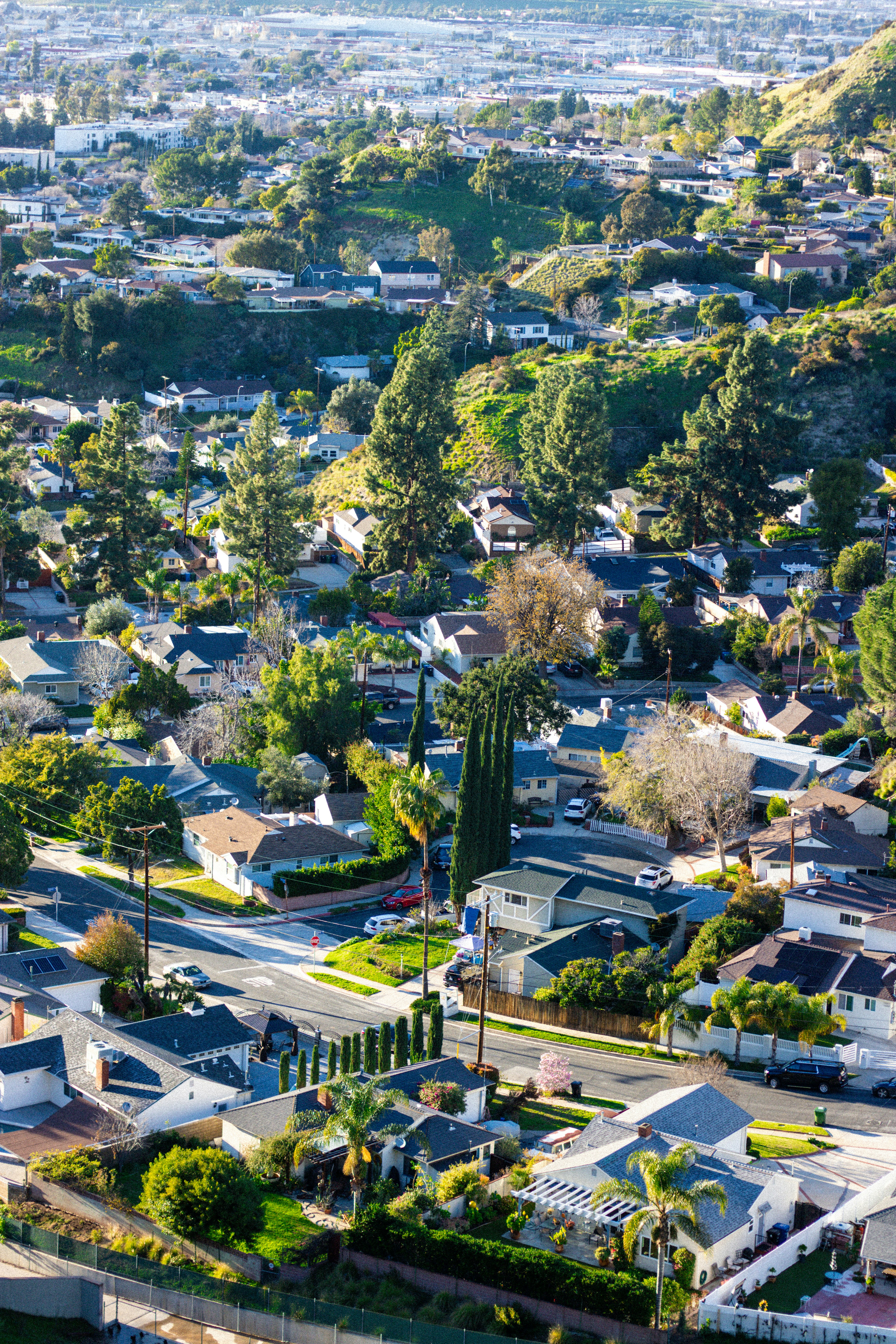 An aerial view of a city with lots of houses