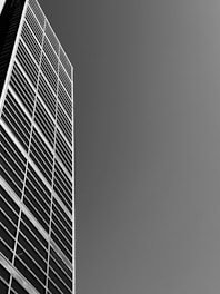 A black and white photo of a tall building