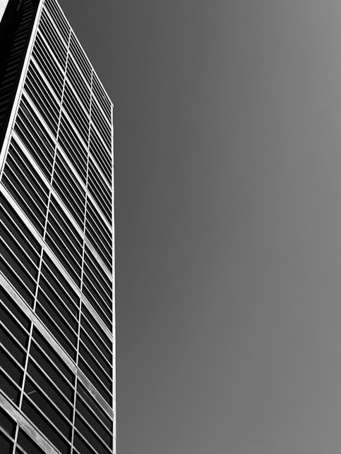 A black and white photo of a tall building