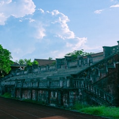 An old building with a clock on the side of it