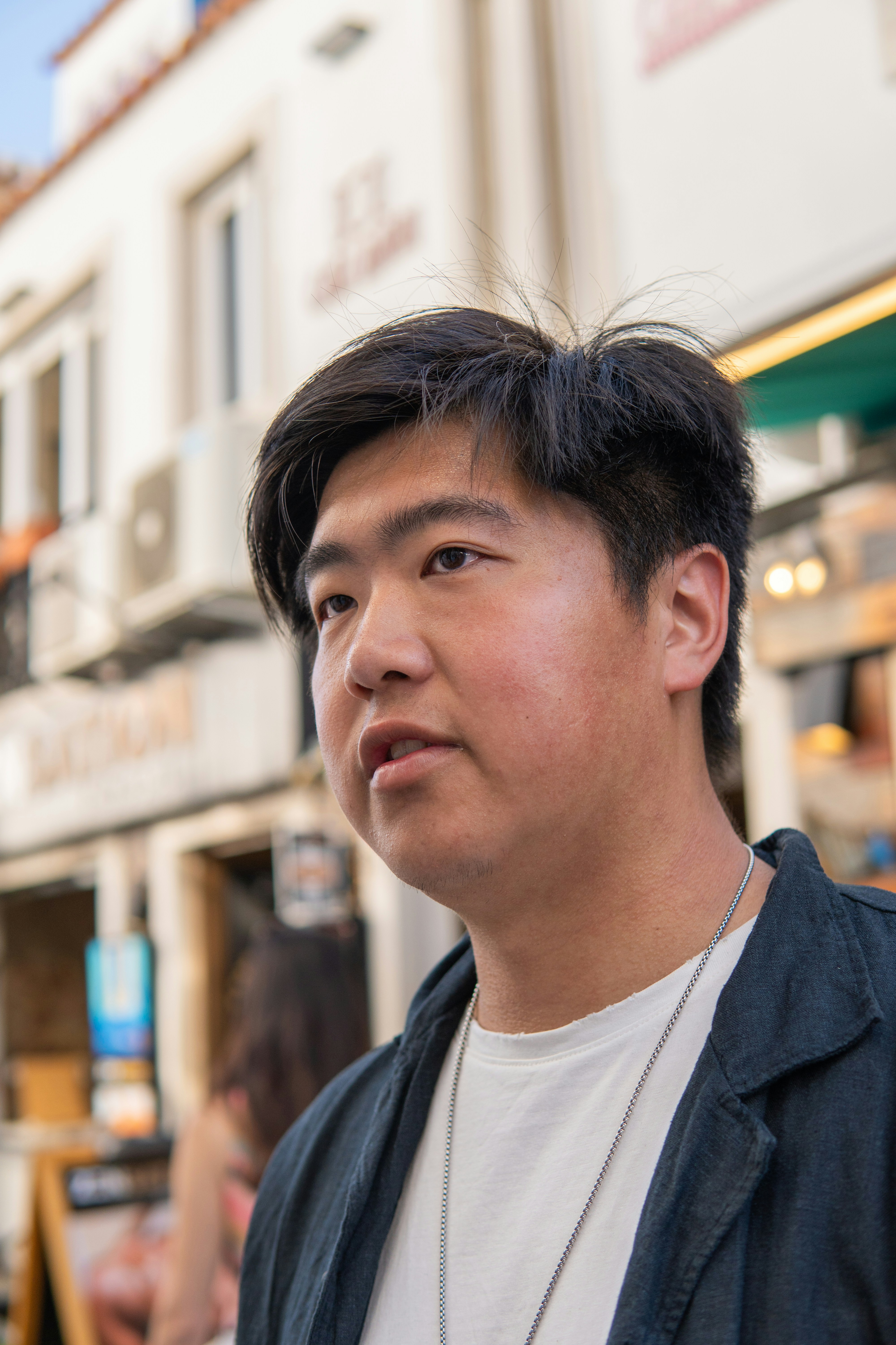 Portrait of David Kim, Engineering Lead at FutureWorks, thoughtful professional headshot