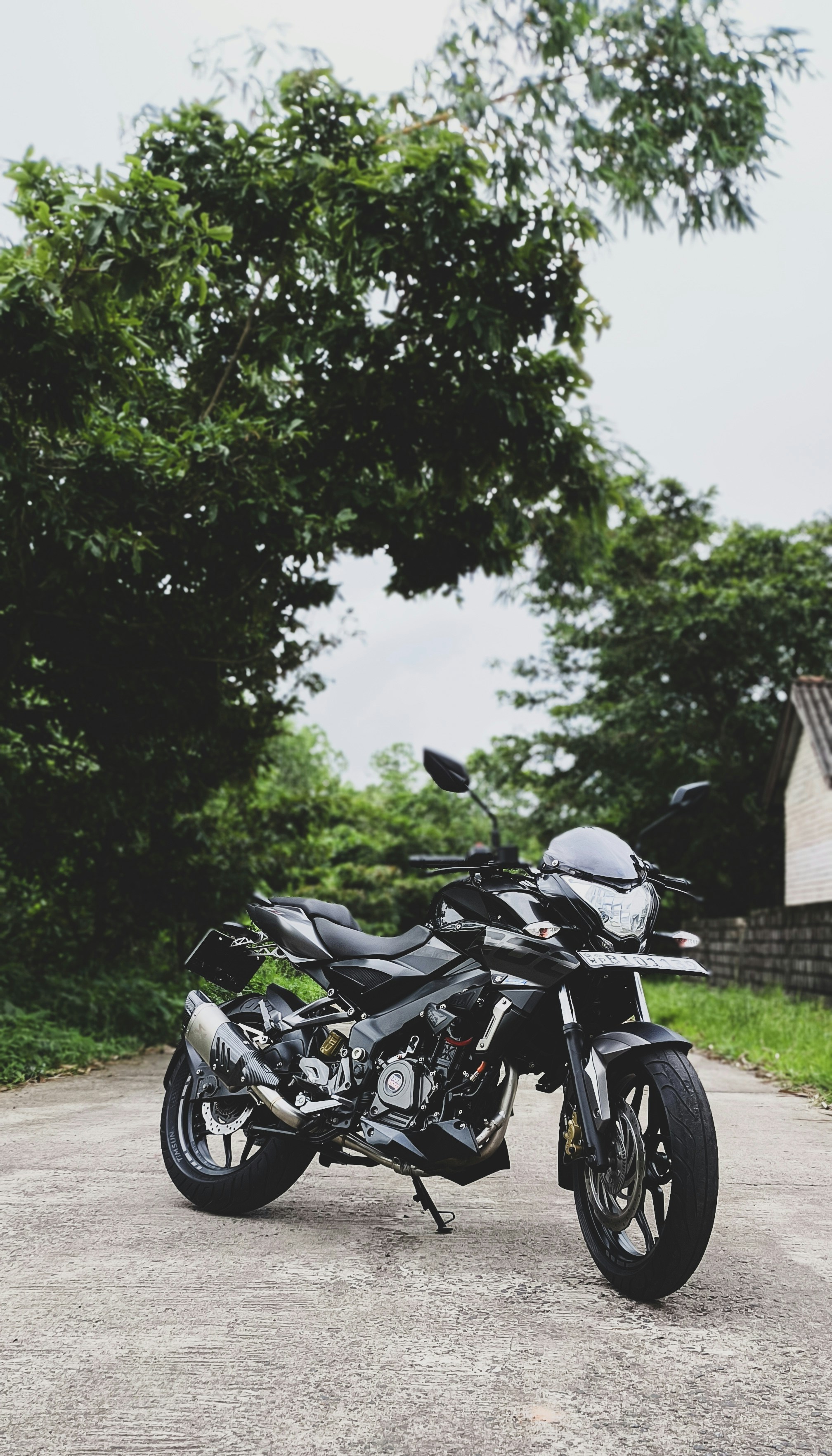 A motorcycle parked on the side of a road