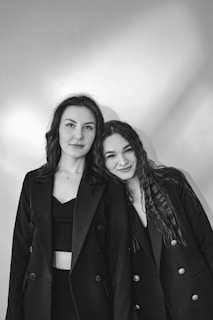 A couple of women standing next to each other