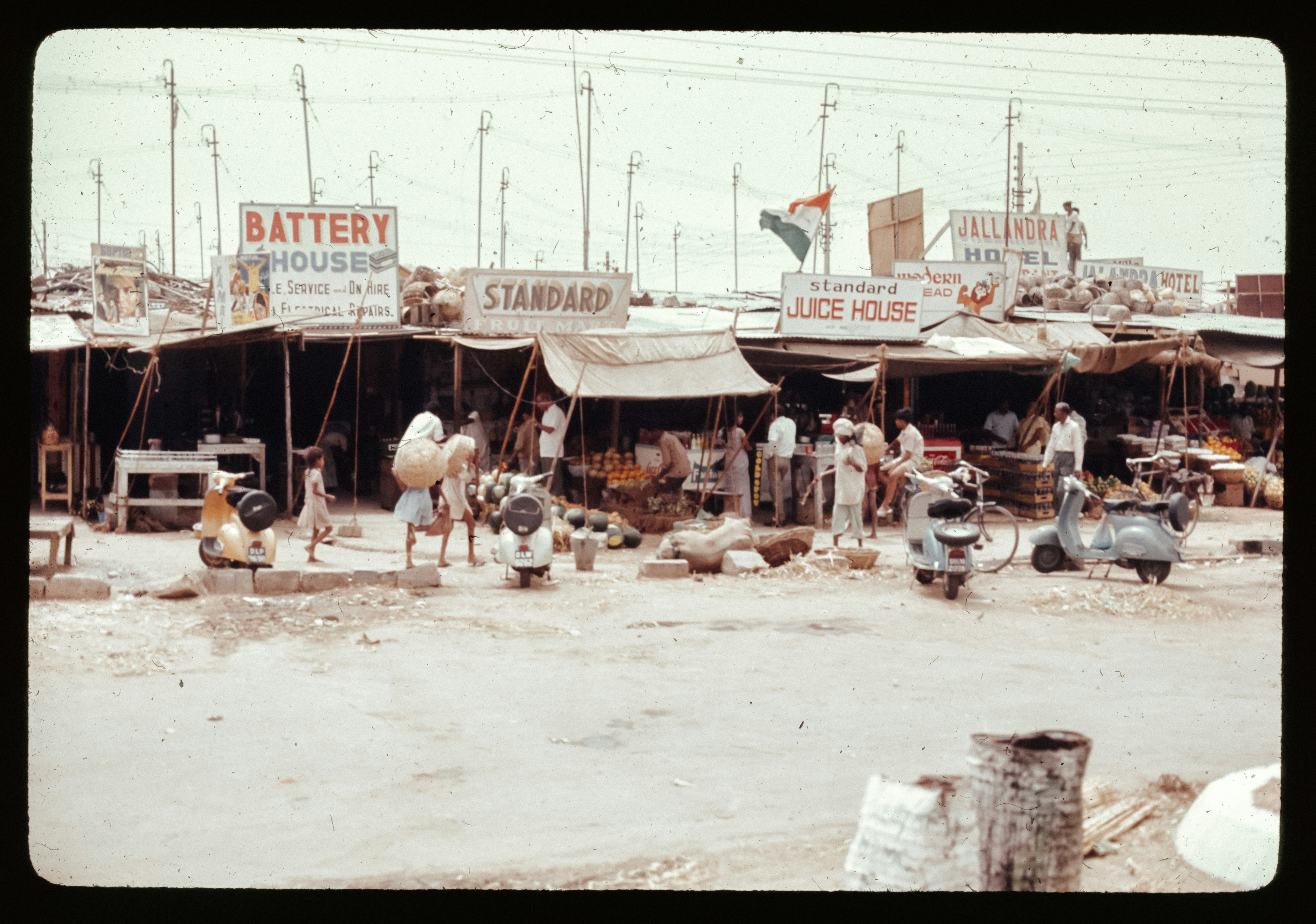 A group of people standing outside of a building