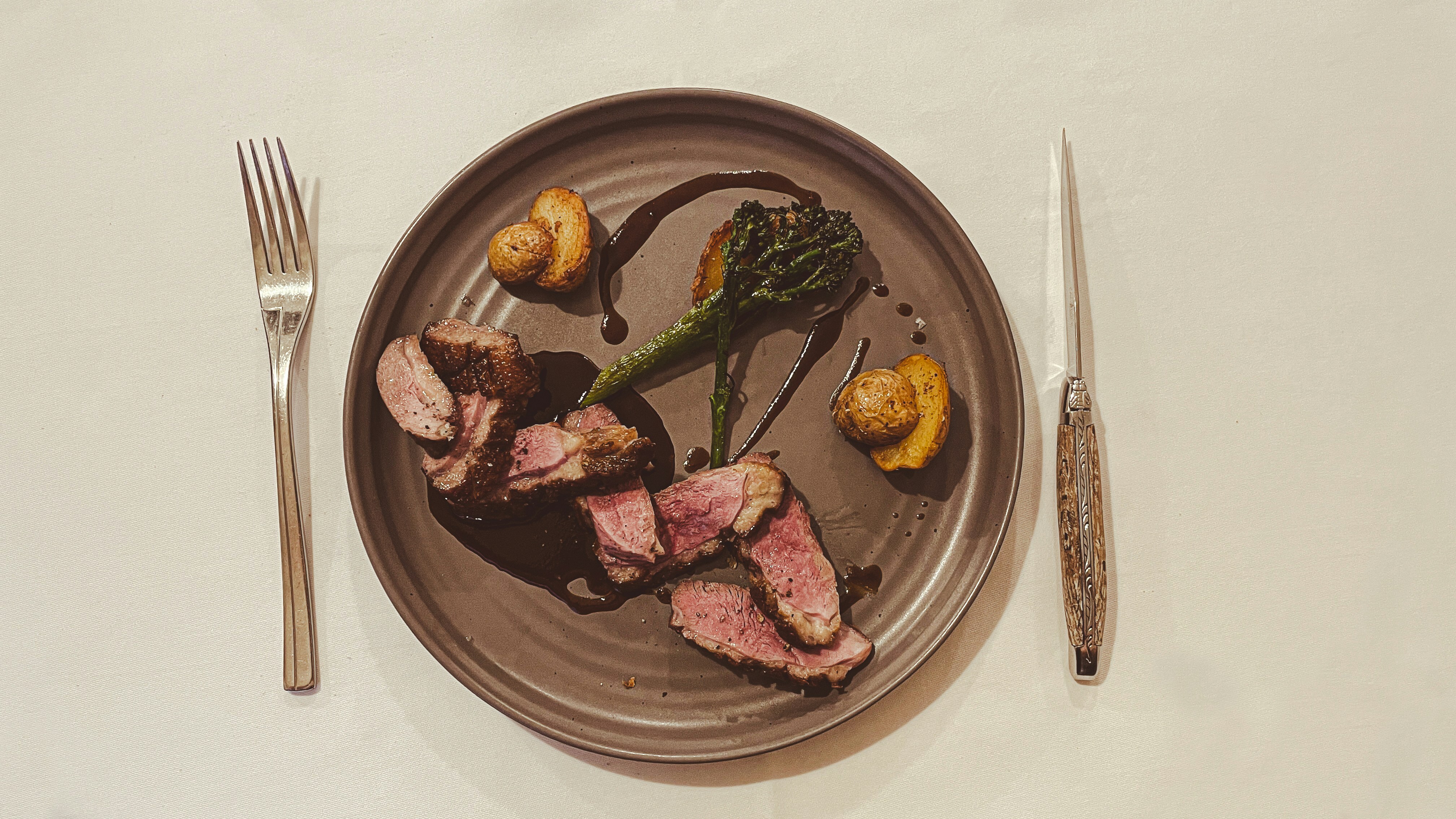 A plate of meat and vegetables