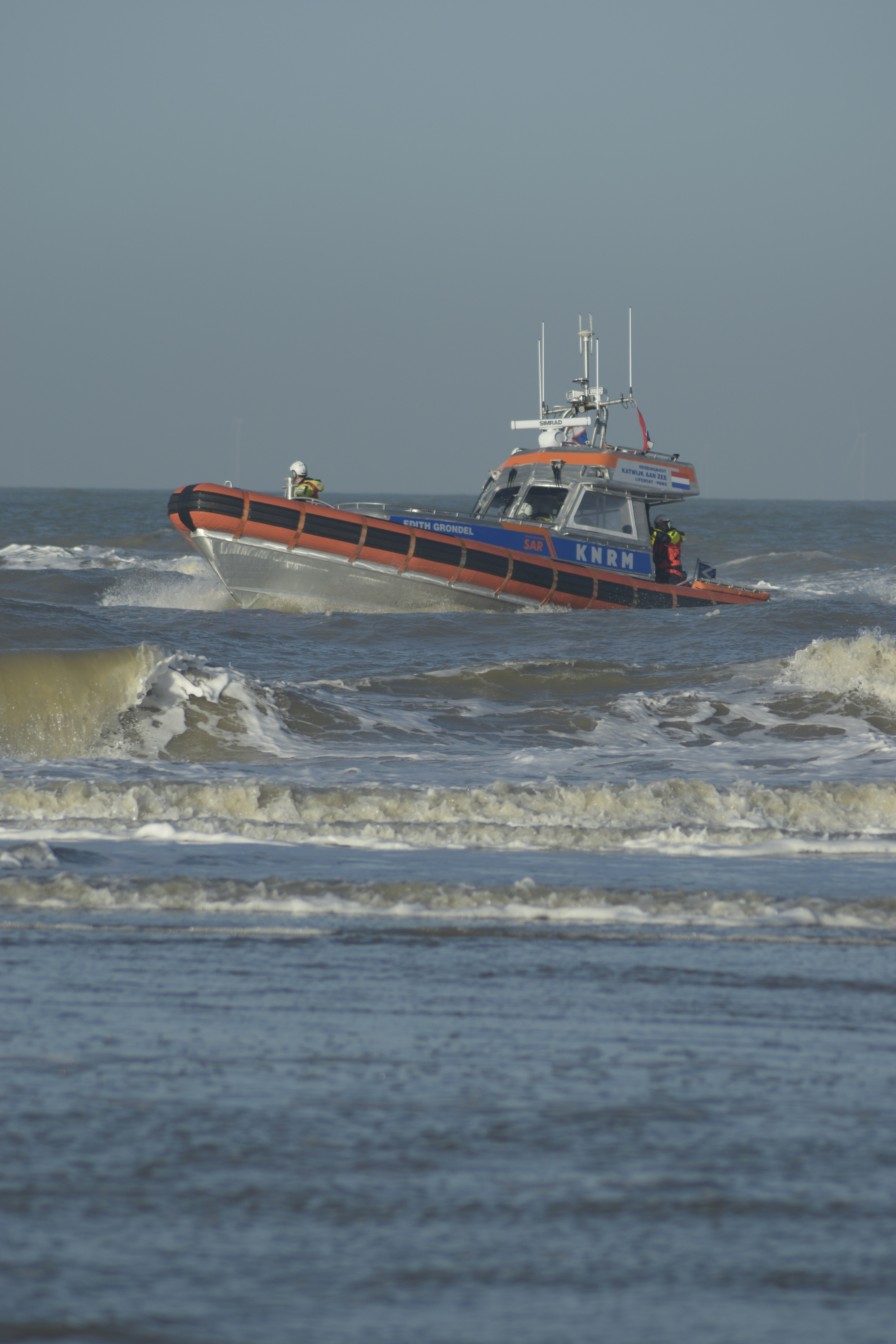 A large boat in the middle of a body of water