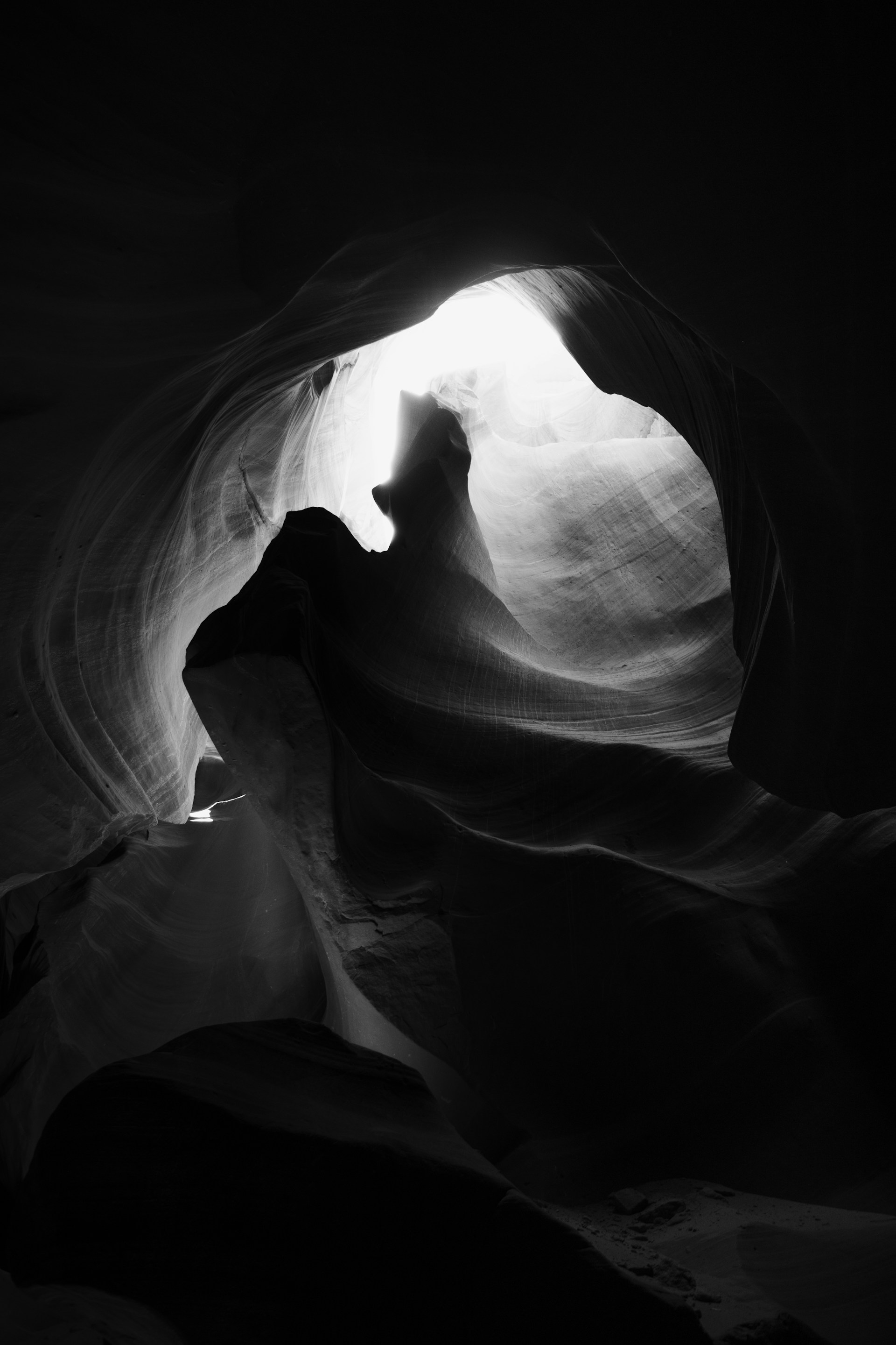 A black and white photo of a rock formation