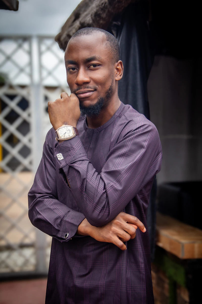 Nigerian man in a striped shirt