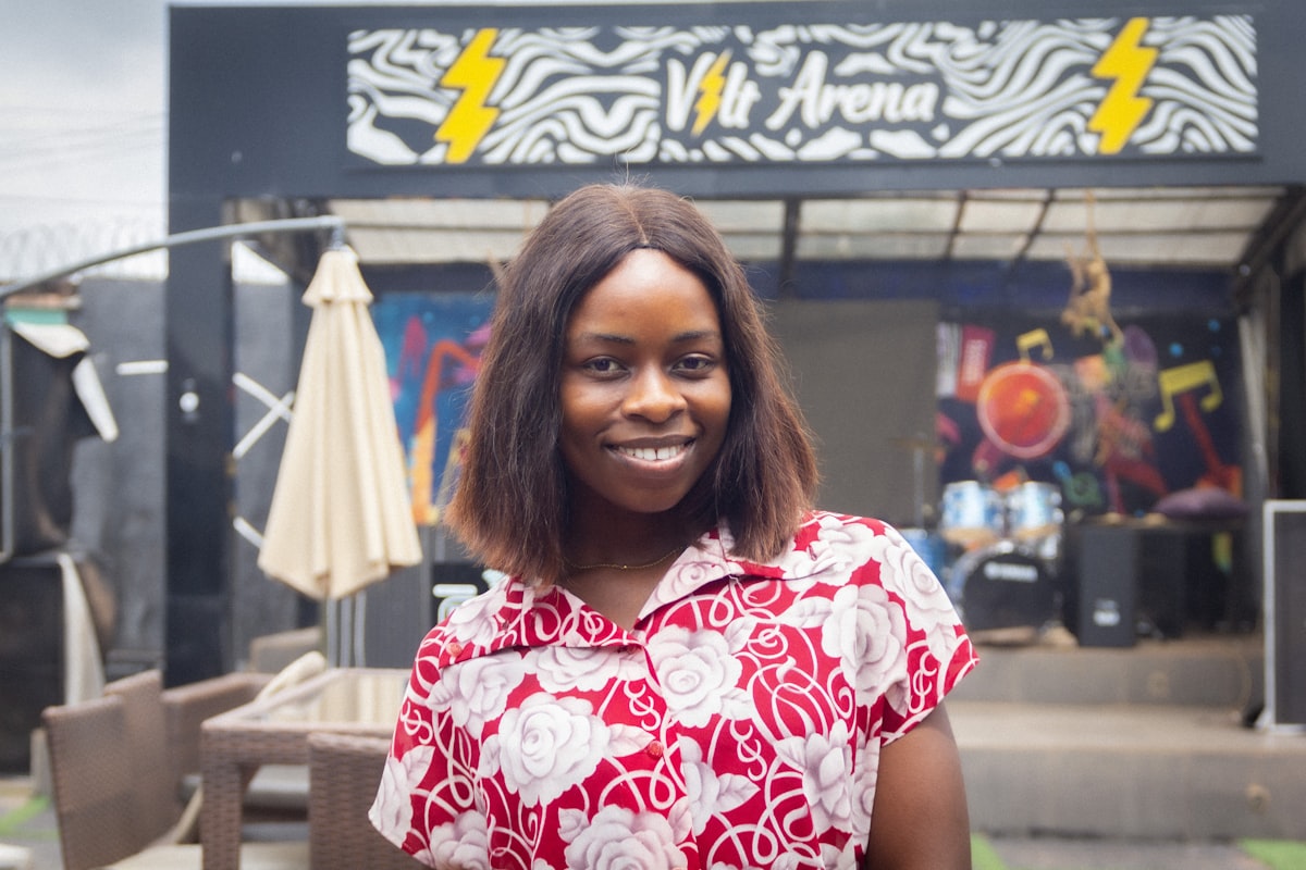 Nigerian shopper with phone