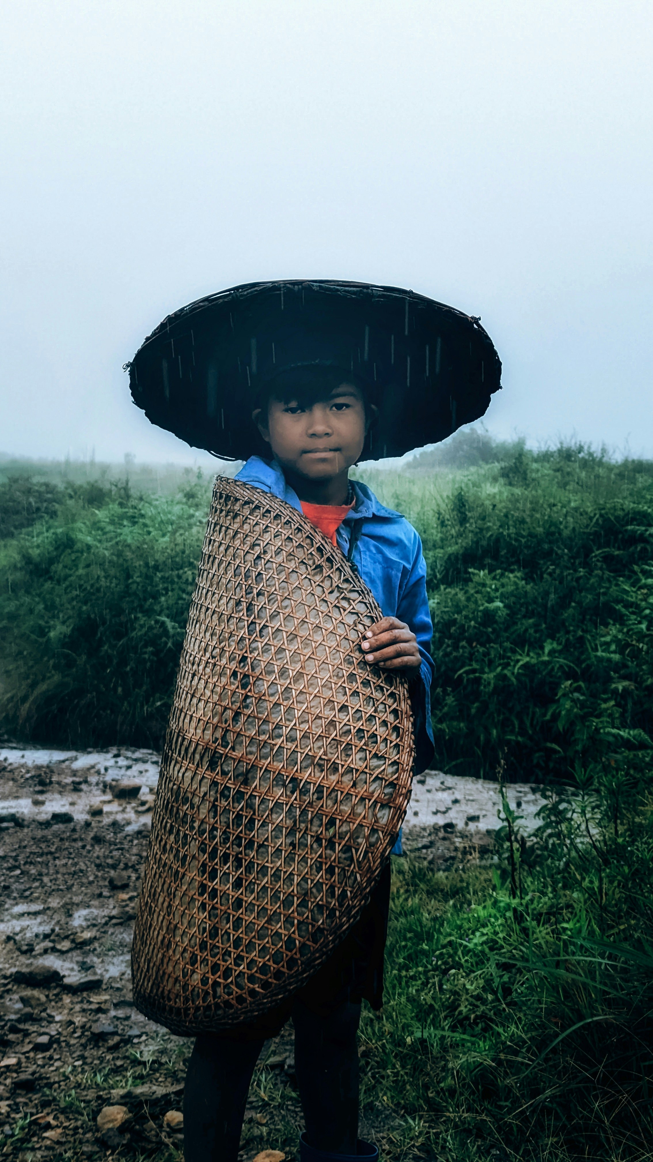 A person with a large bag on their head