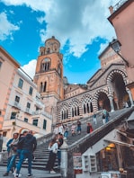 A group of people walking up and down a set of stairs