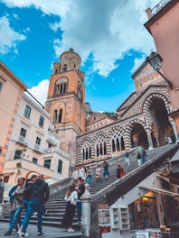 A group of people walking up and down a set of stairs