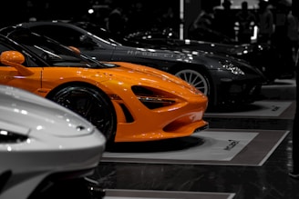 A bunch of cars that are on display