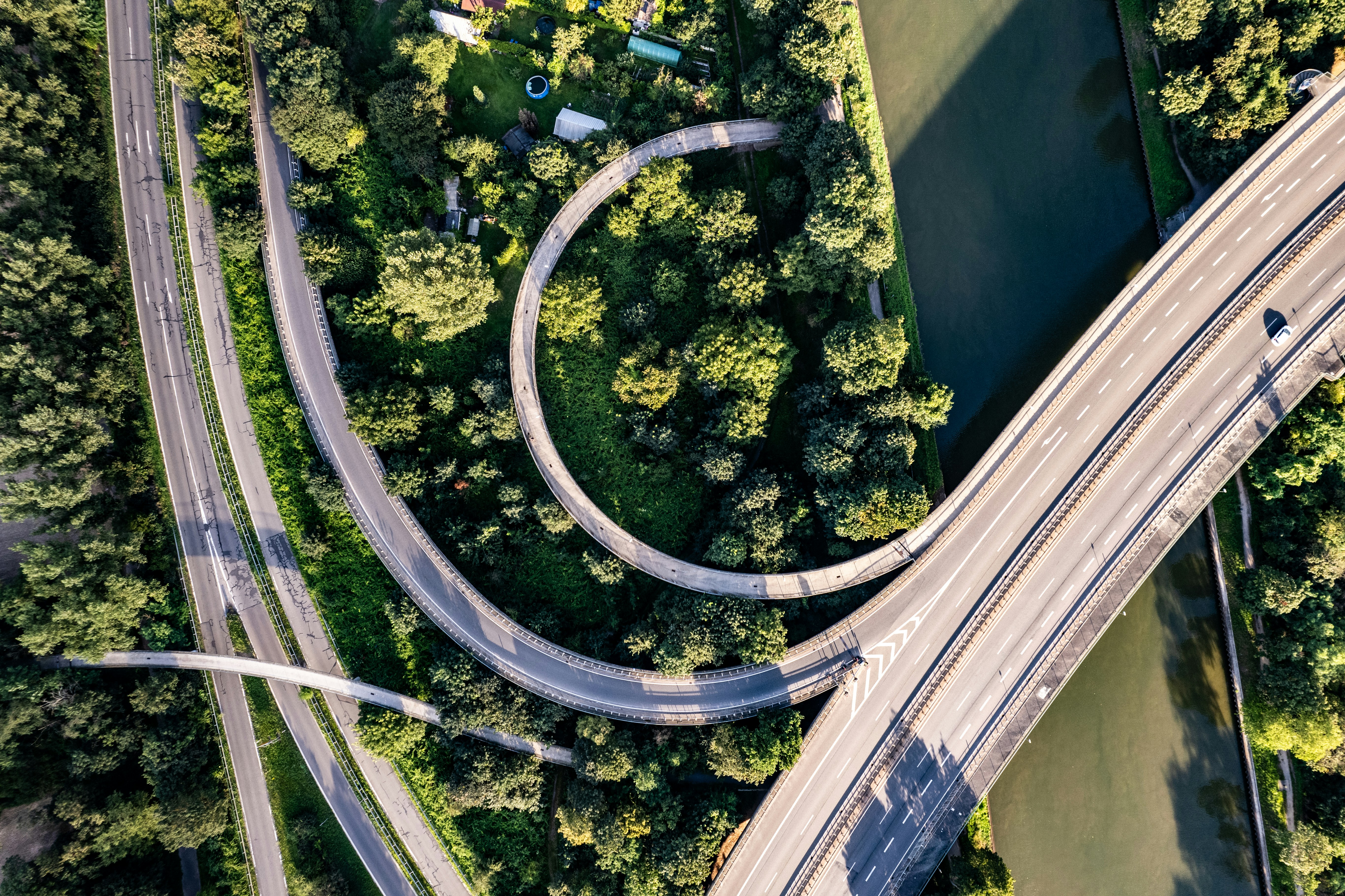 An aerial view of a highway intersection with multiple lanes