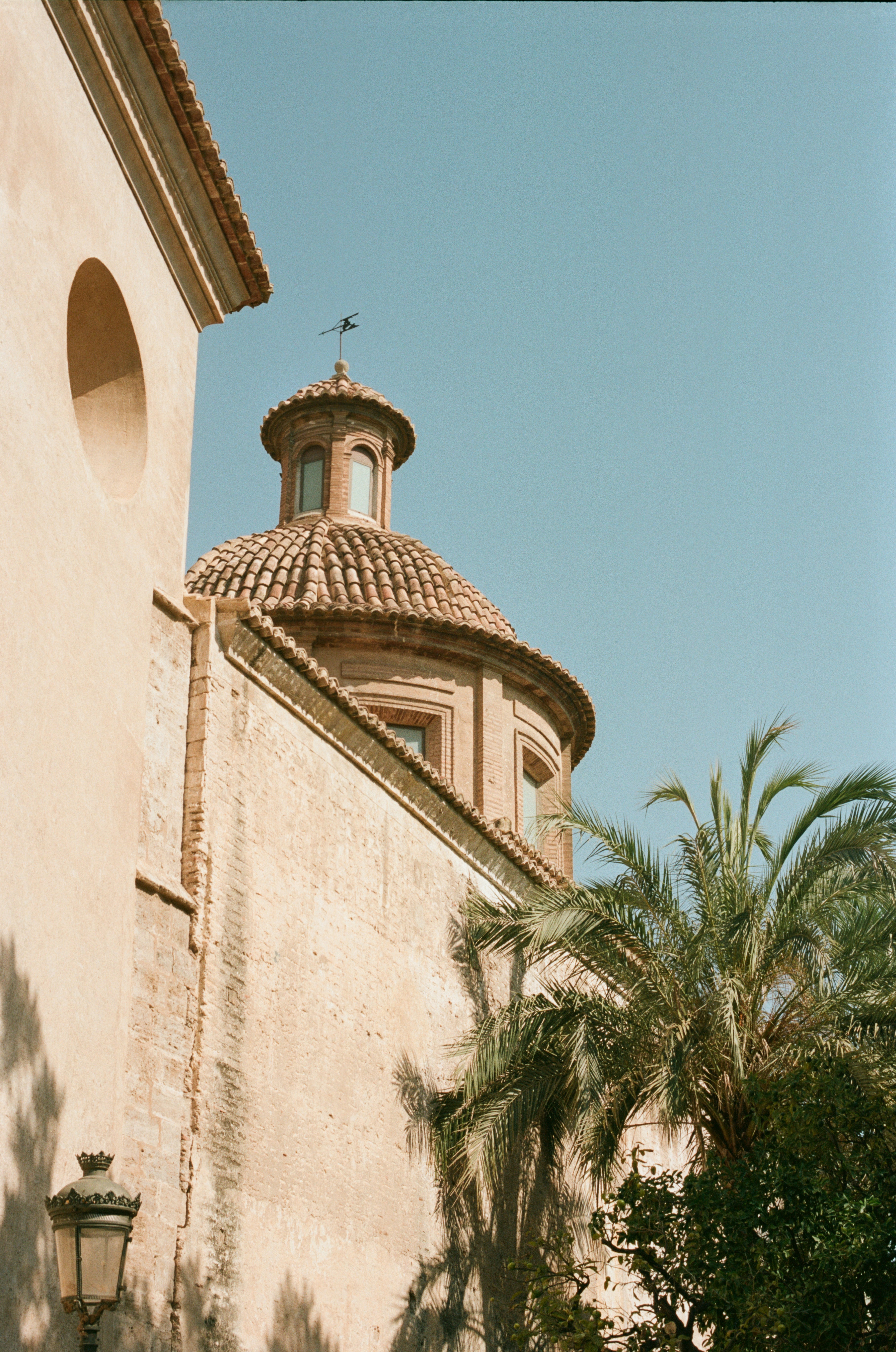 A tall building with a dome on top of it