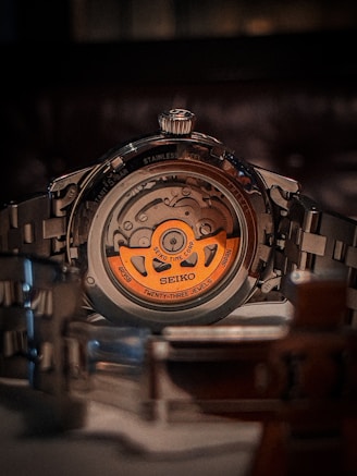 A close up of a watch on a table