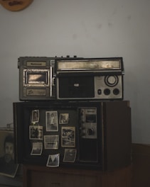 An old radio sitting on top of a table