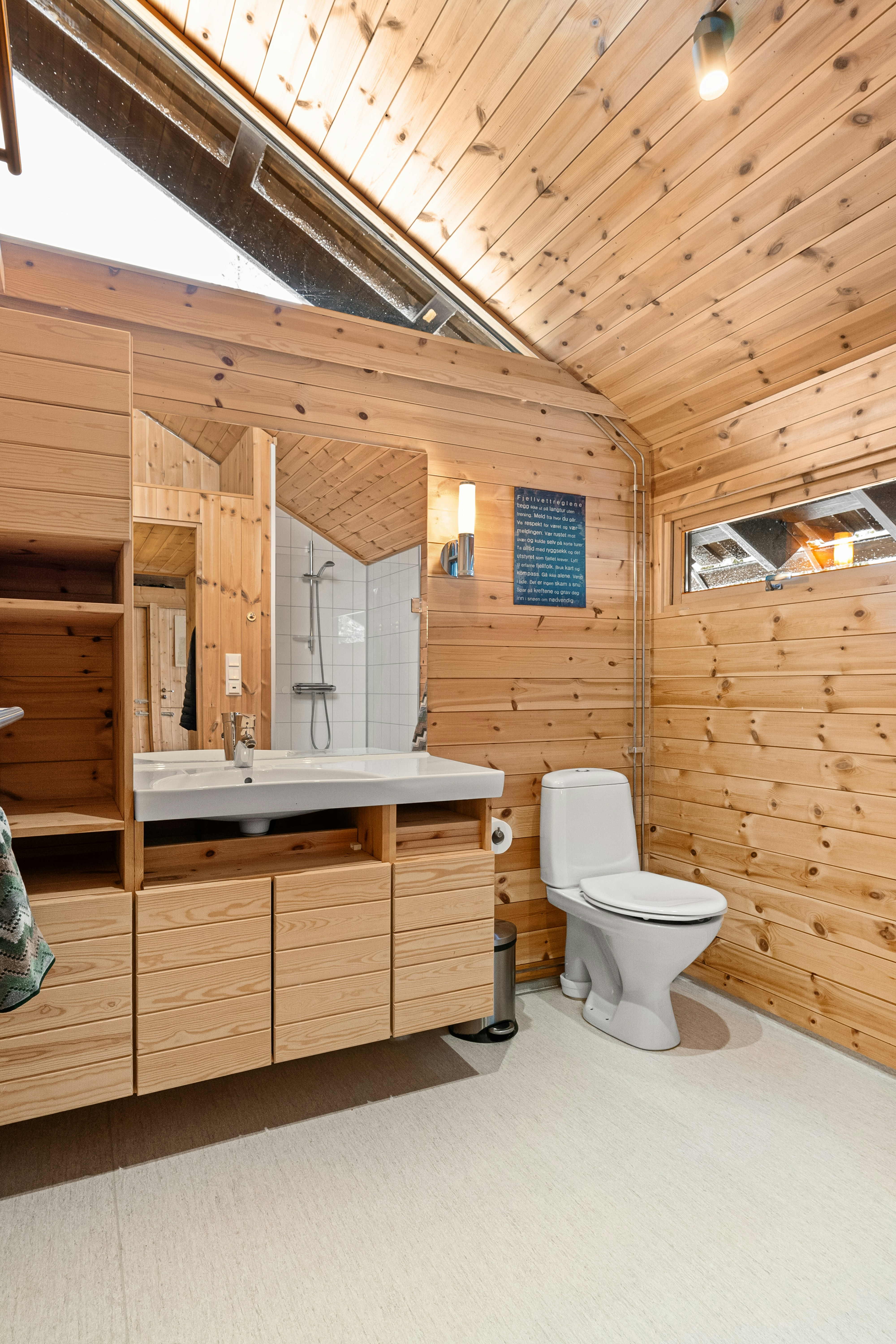 Image of a remodeled small bathroom with cost-effective materials