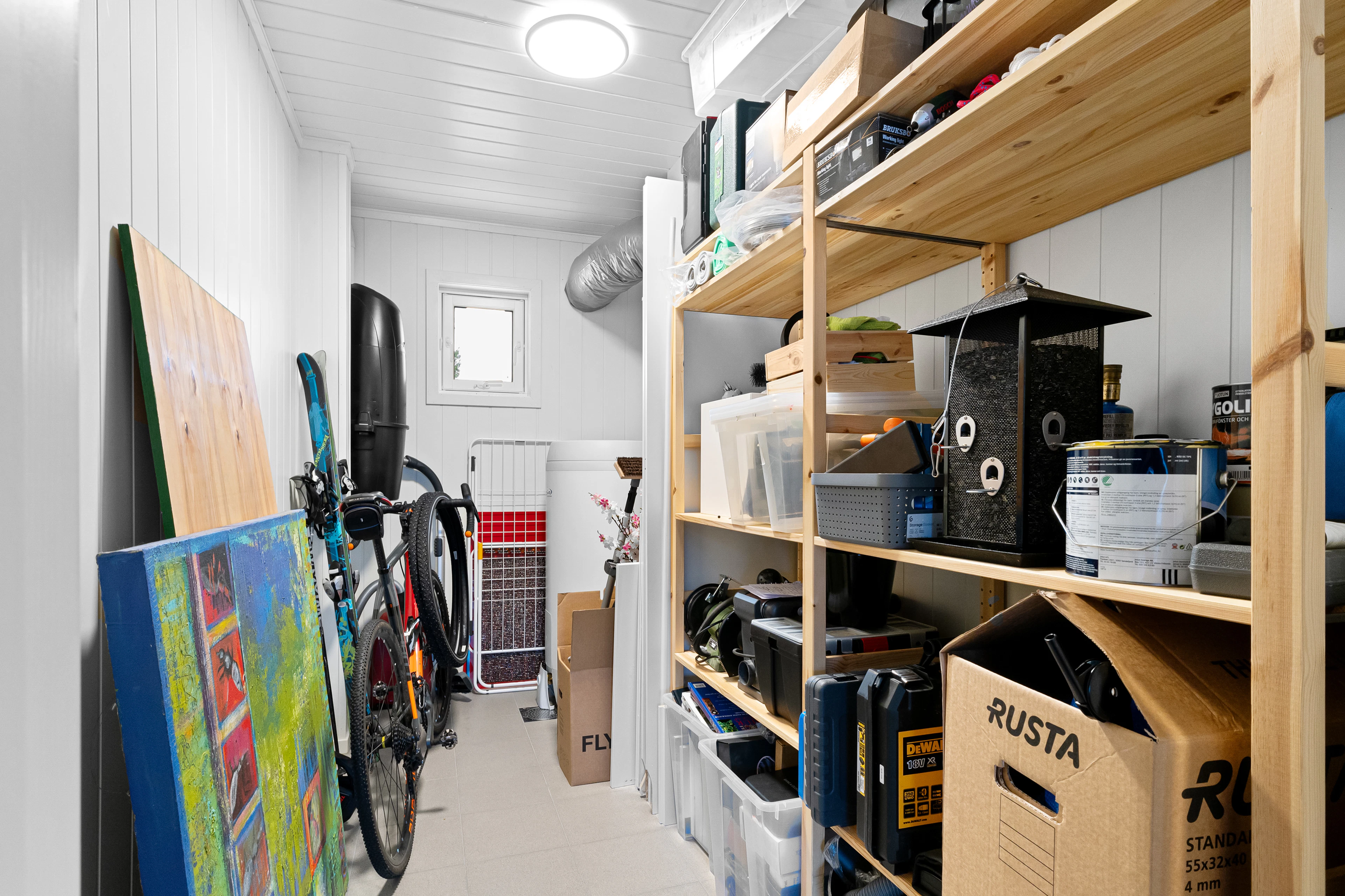 Long storage room with shelving