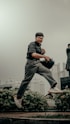 A man jumping in the air on a skateboard