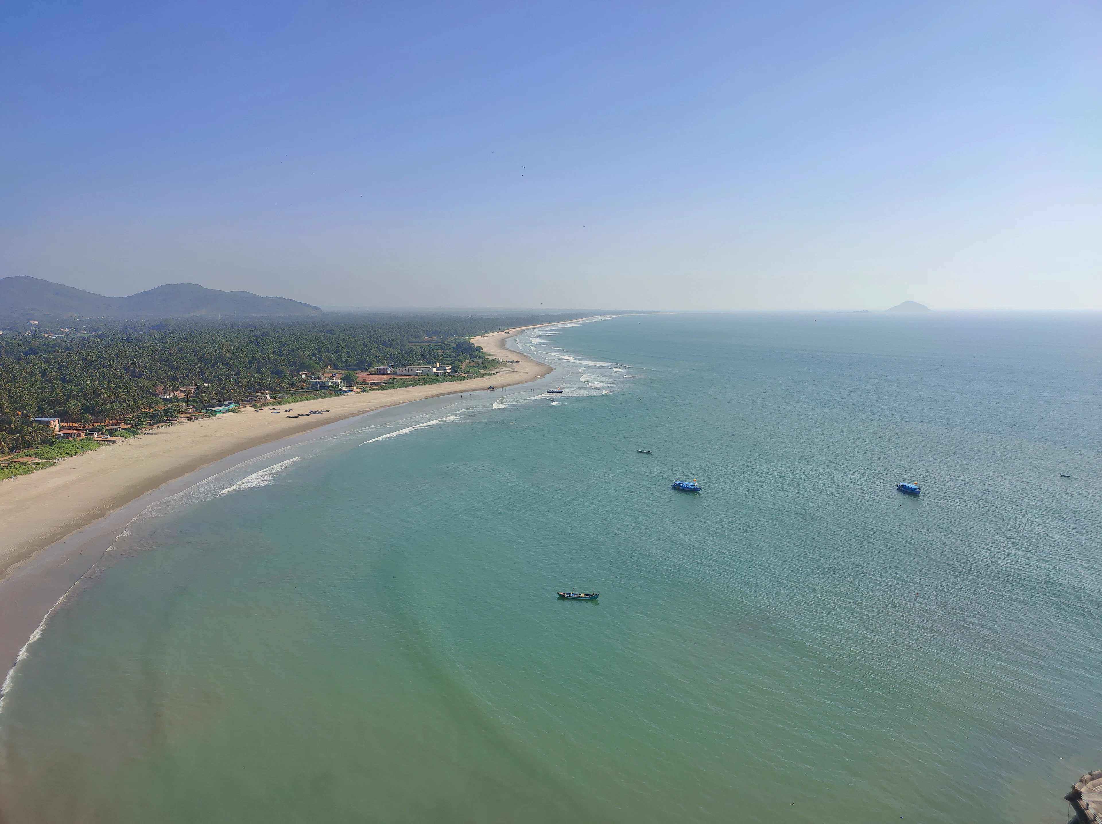 An aerial view of a southern beach with boats