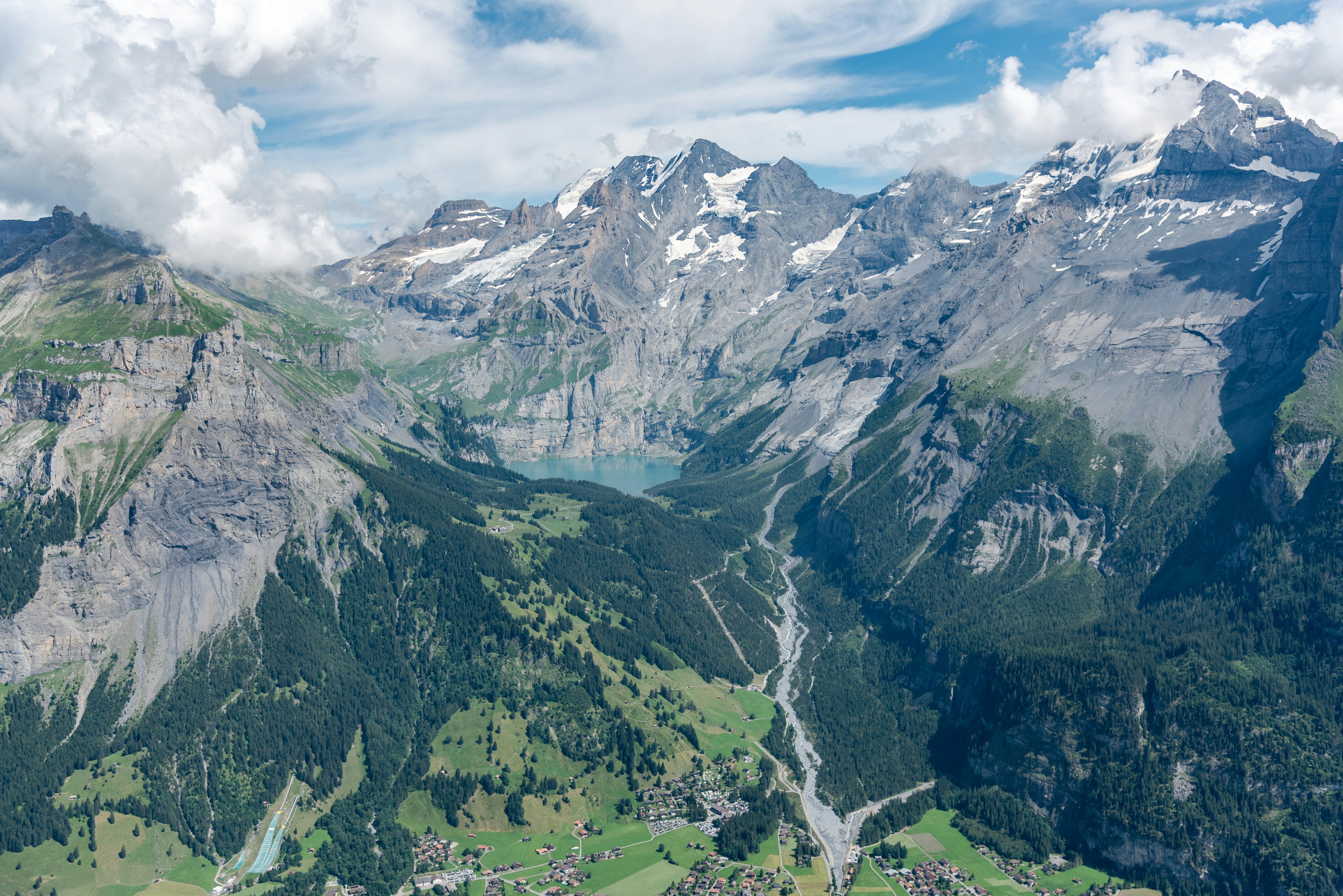 A view of a mountain range with a river running through it