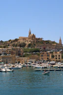 A bunch of boats that are in the water