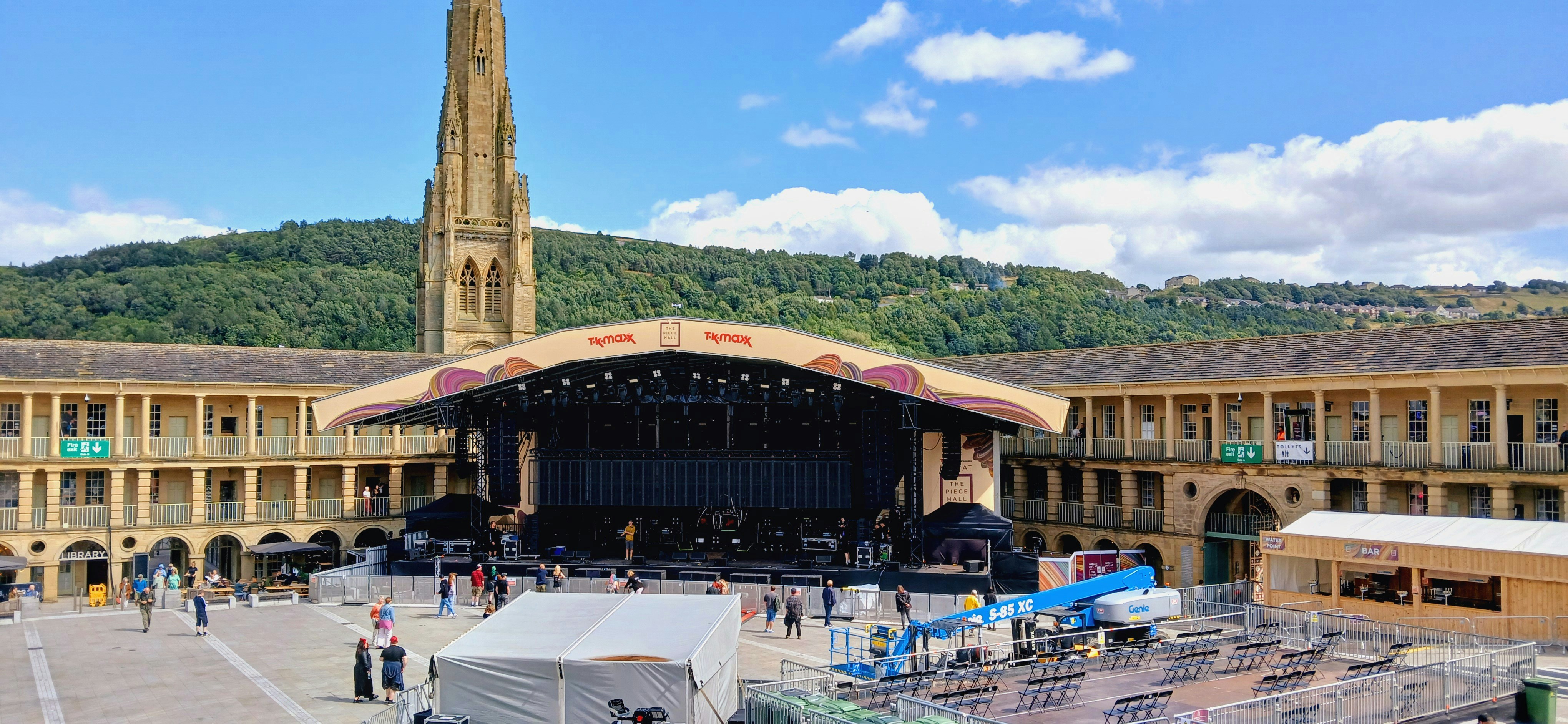 A large building with a clock tower in the middle of it