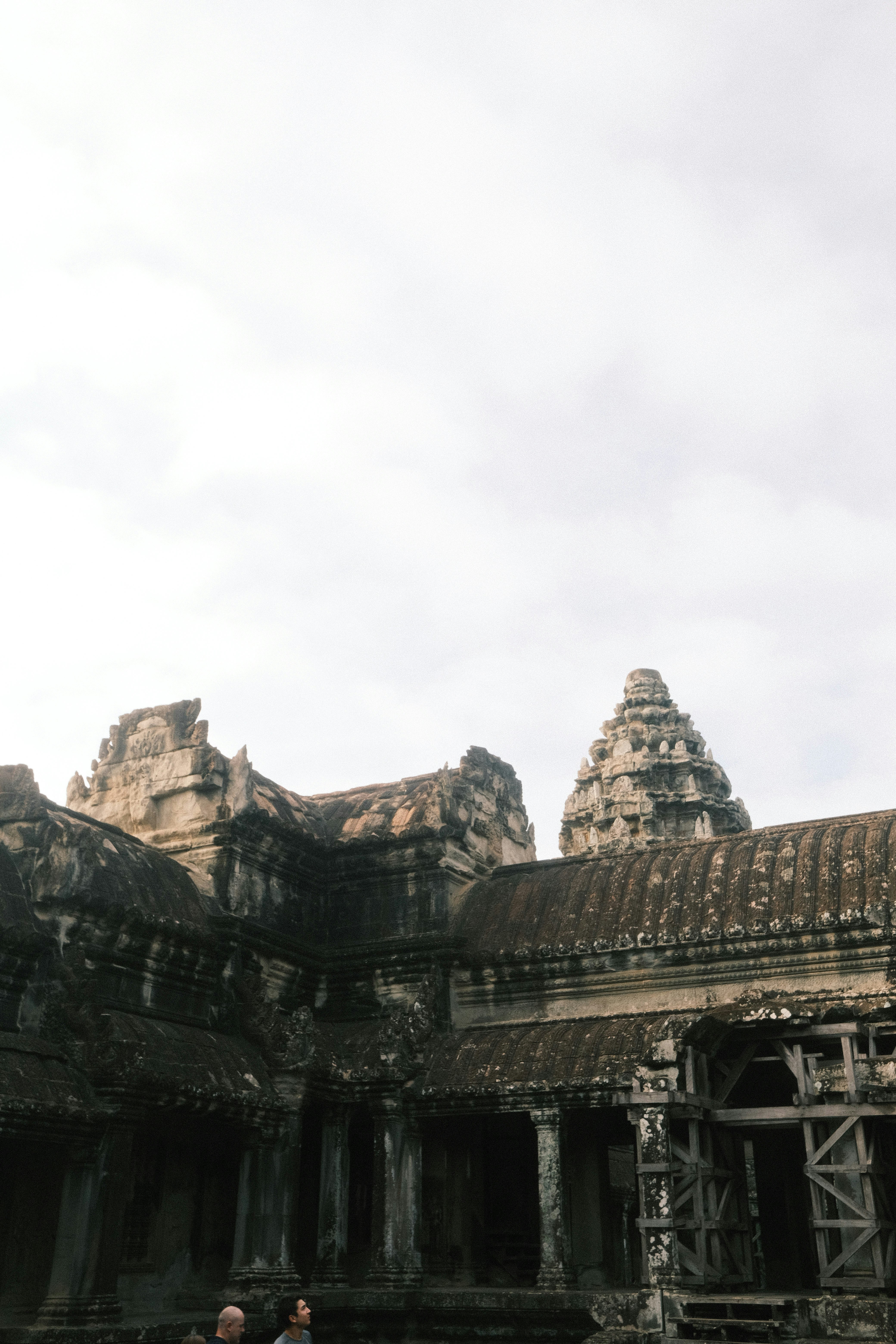 A group of people standing in front of a building