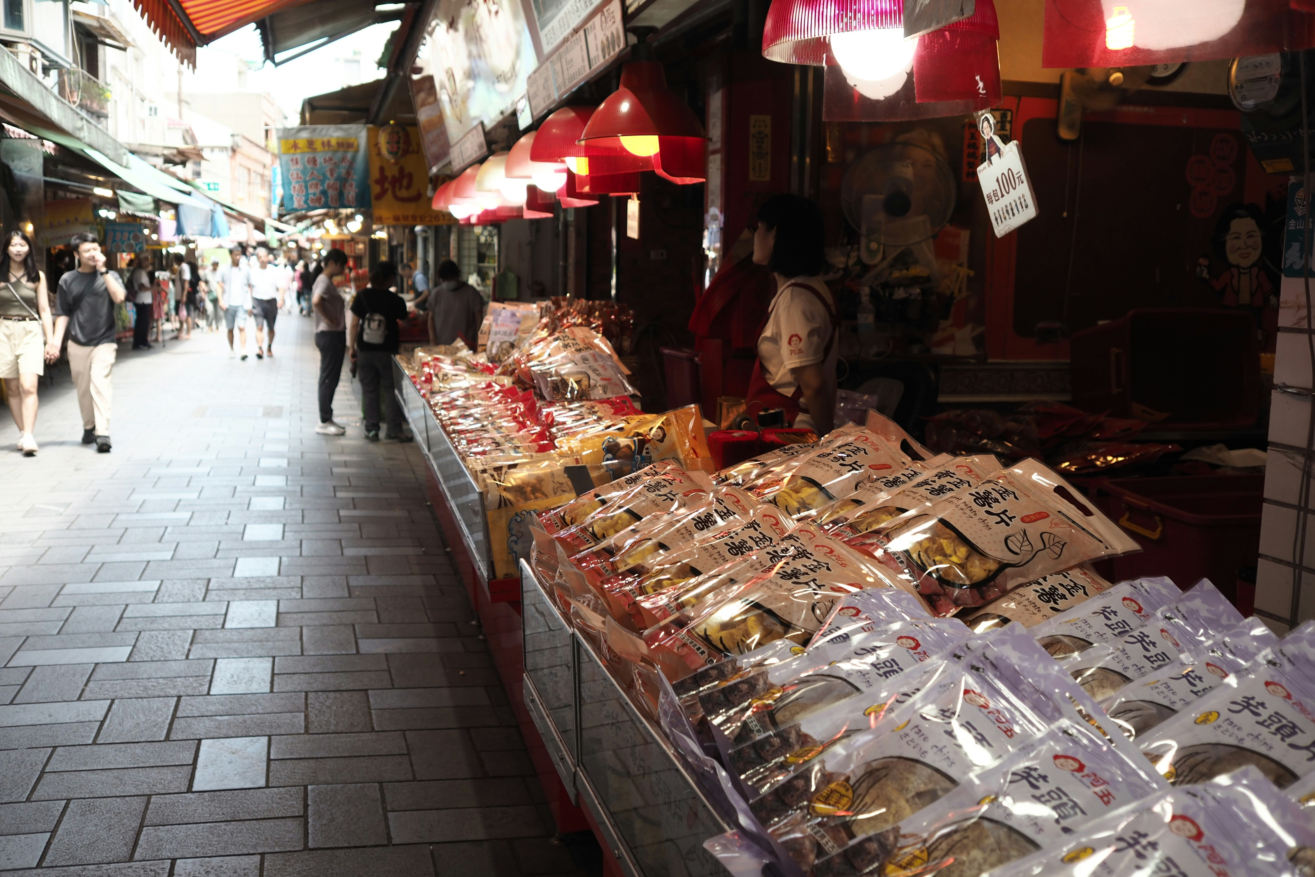 A market area with people walking around it