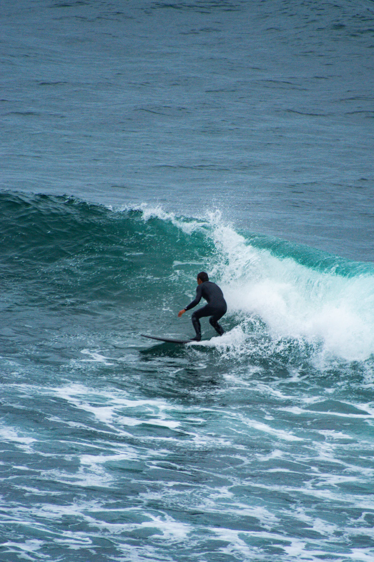 Person practicing high adrenaline water sports in the sea