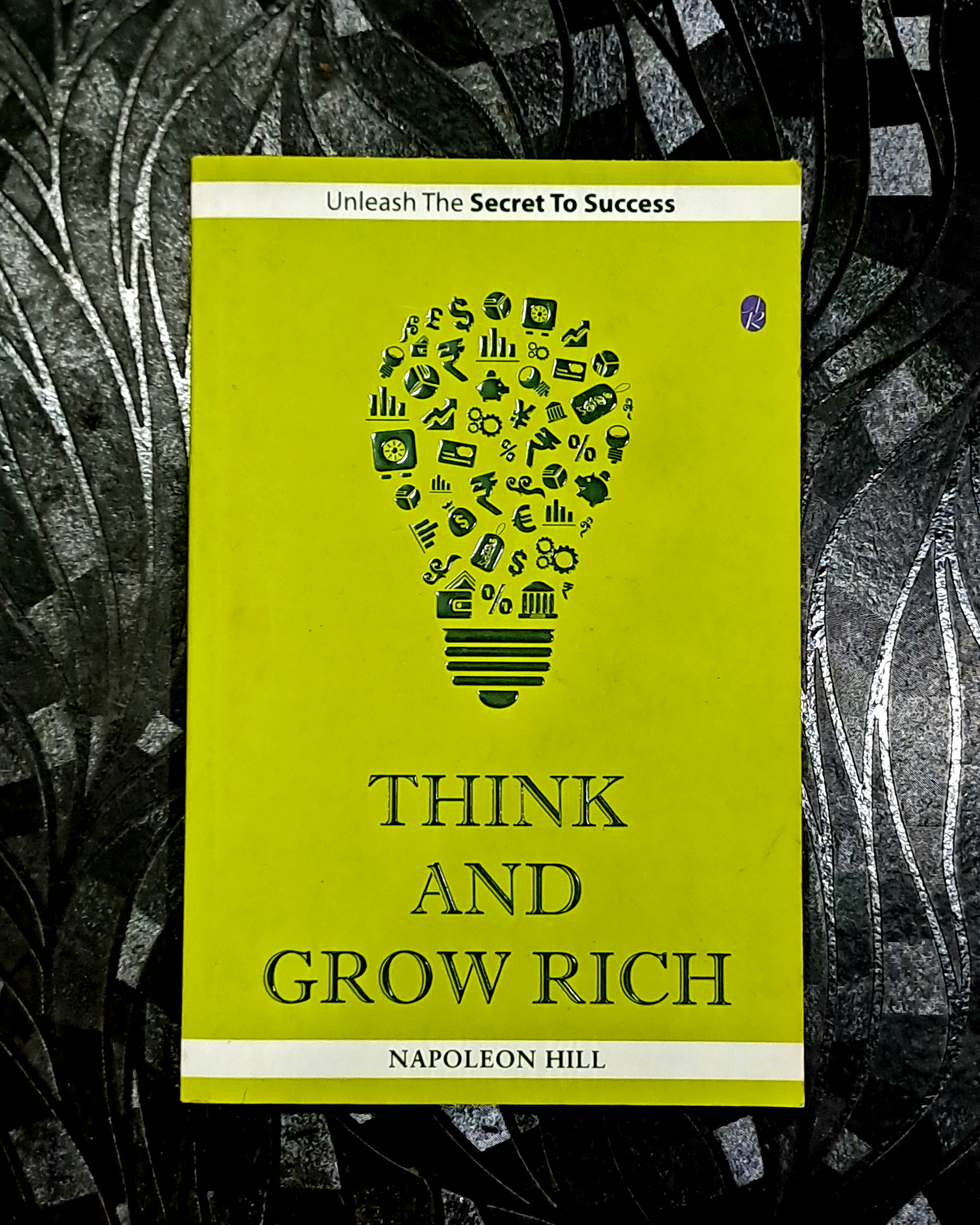 Think and Grow Rich cover with gold coins and success imagery