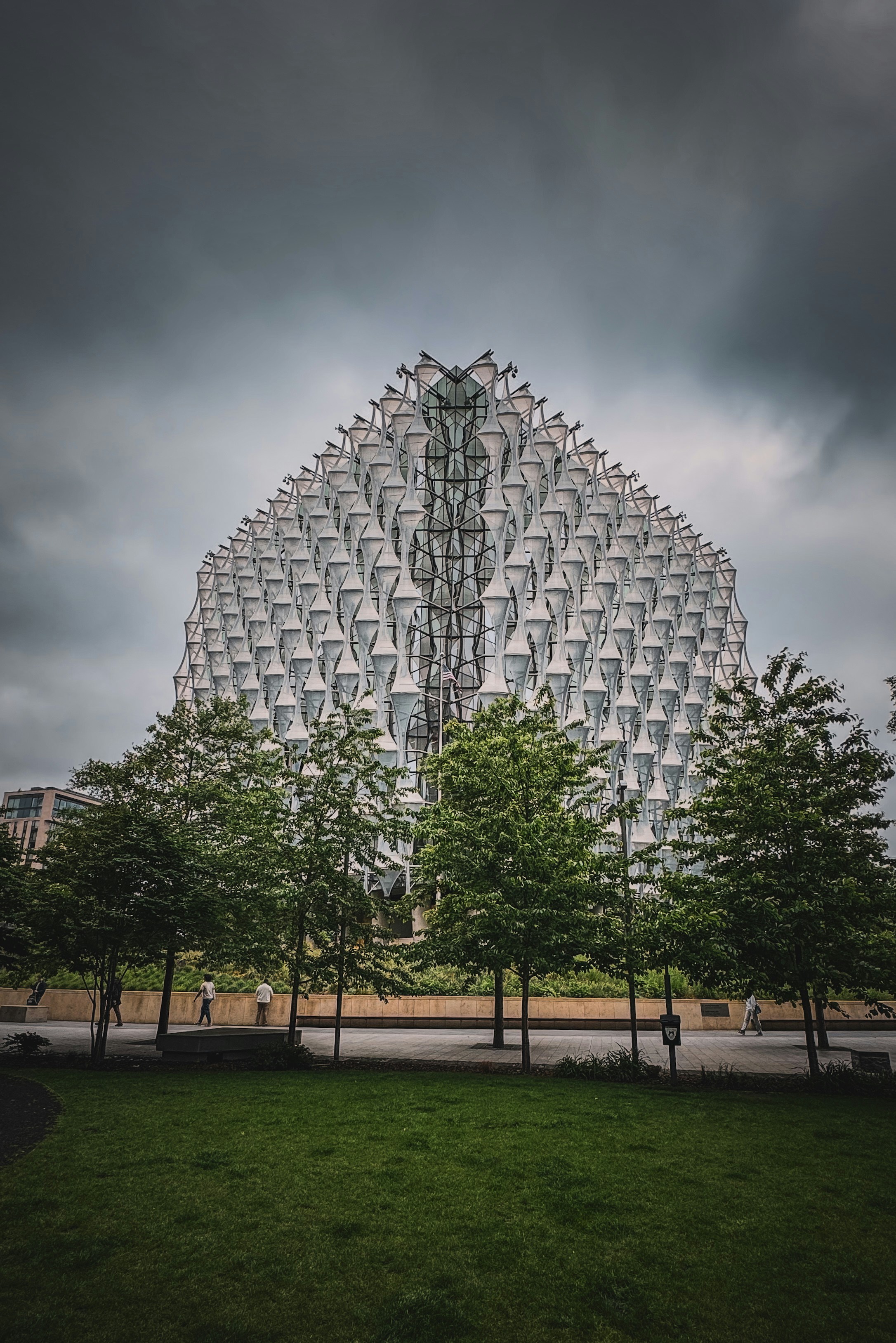 A very large building that is in the middle of a field photo – Free ...