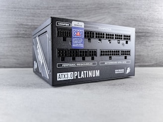 A black box with a blue label on it