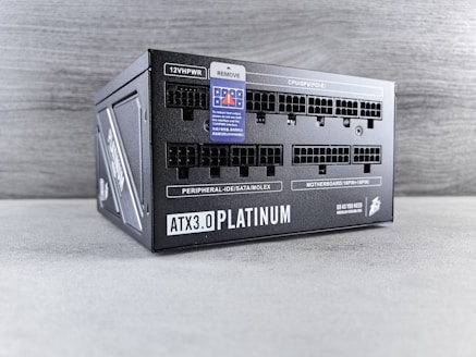 A black box with a blue label on it