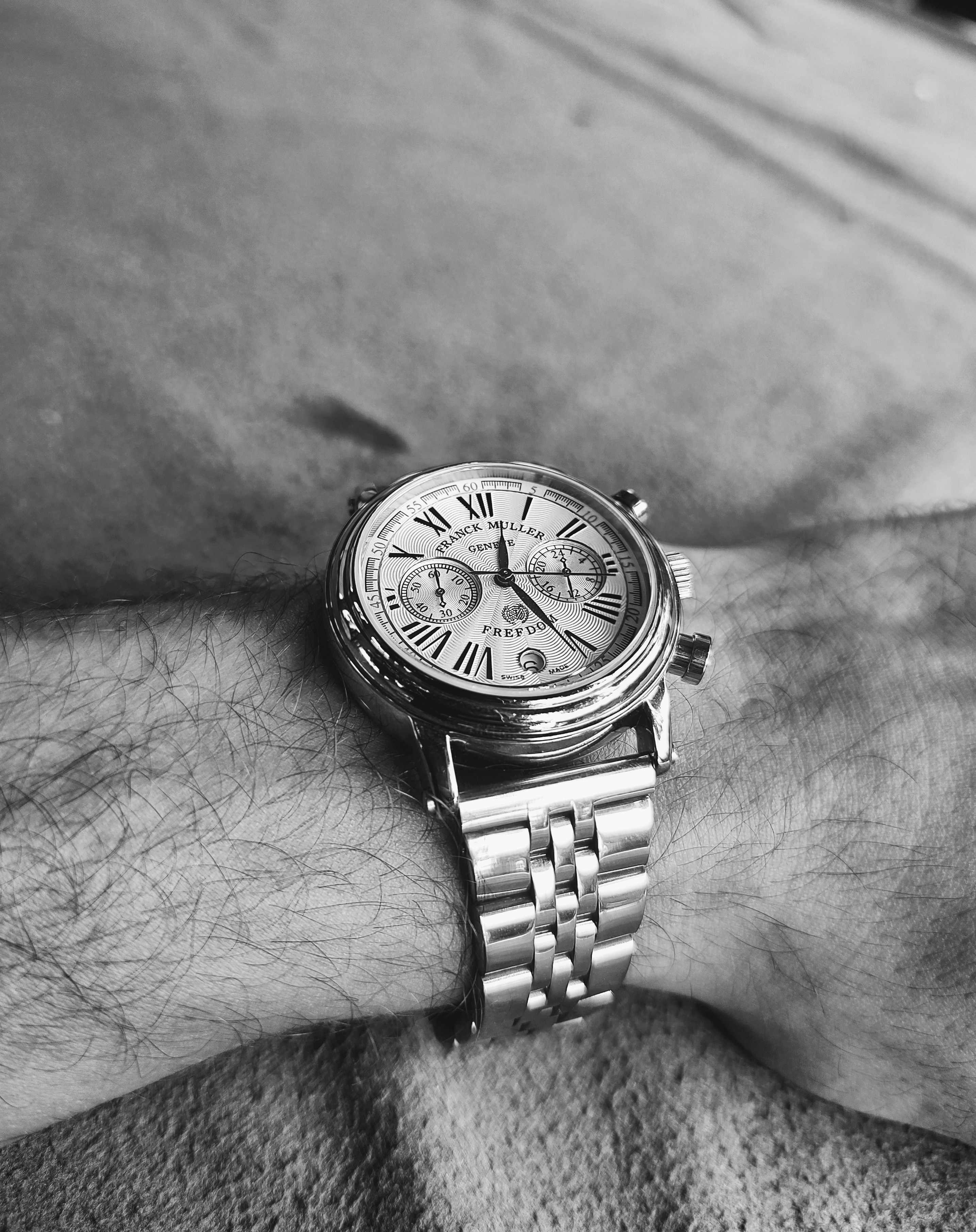 A close up of a person wearing a watch