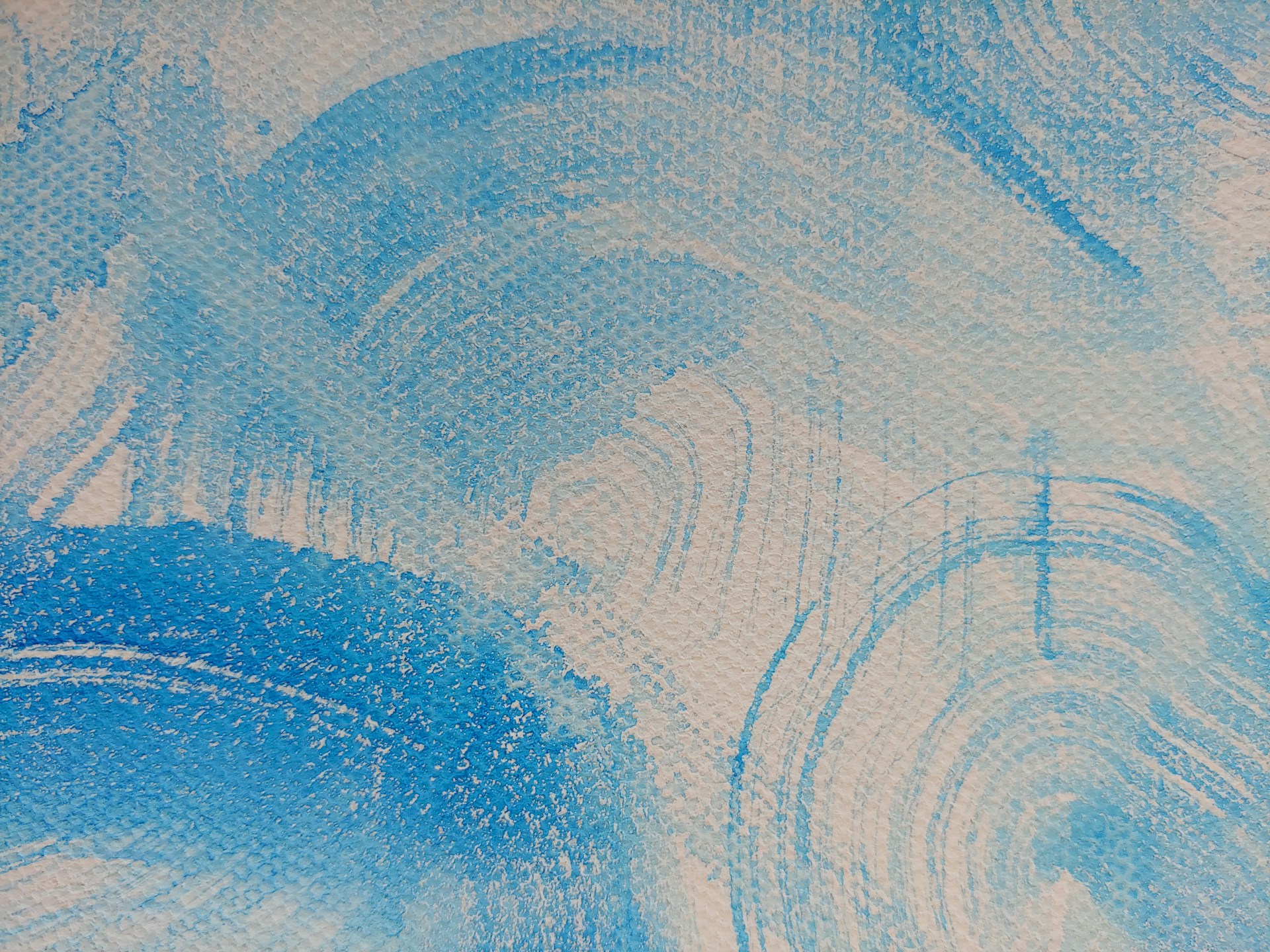 A close up of a blue and white painting