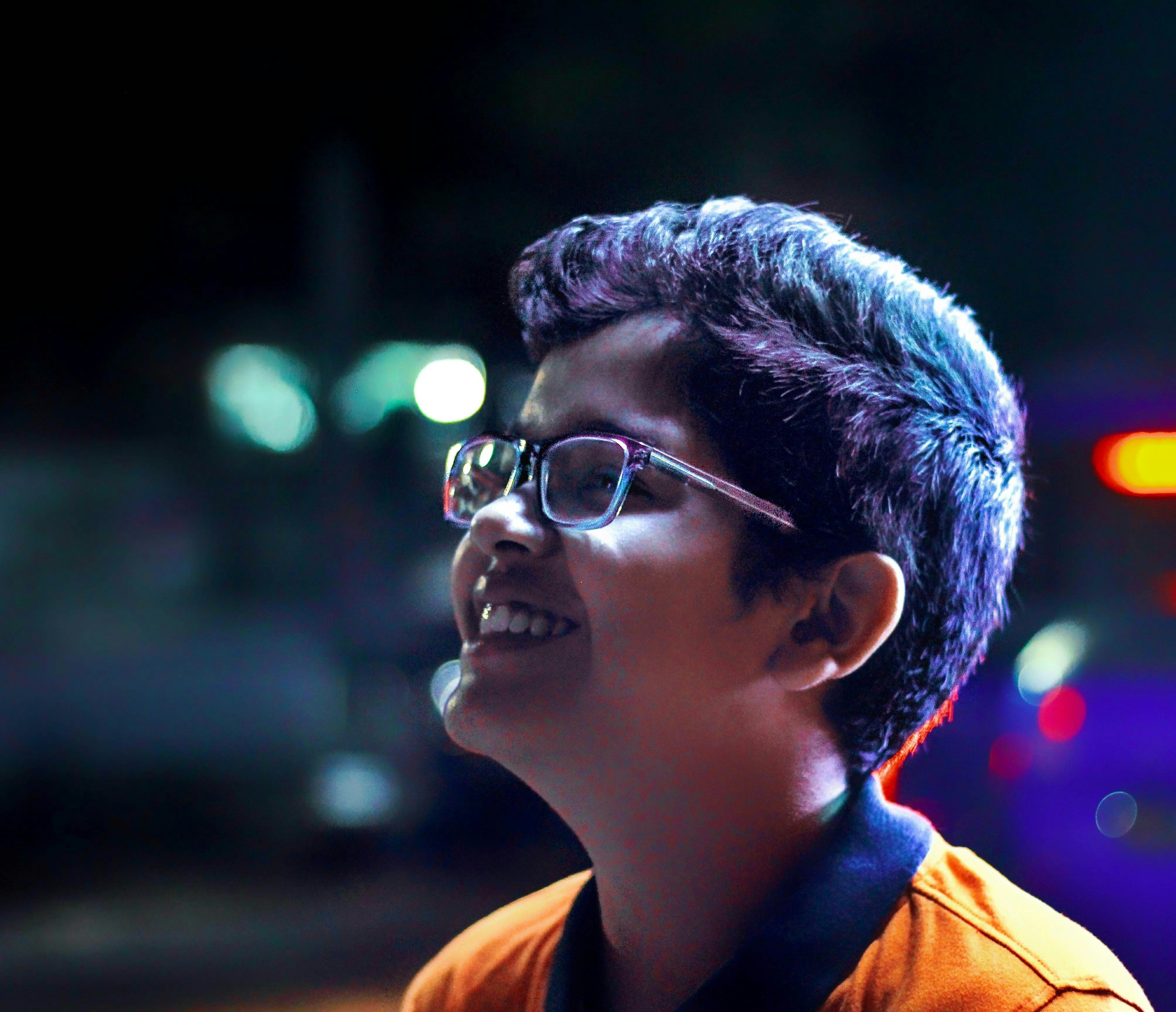 Designer choosing cartoon avatar styles to define digital identity