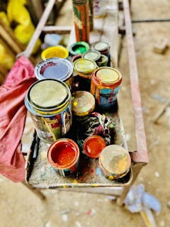 A tray of paint sitting on top of a wooden table