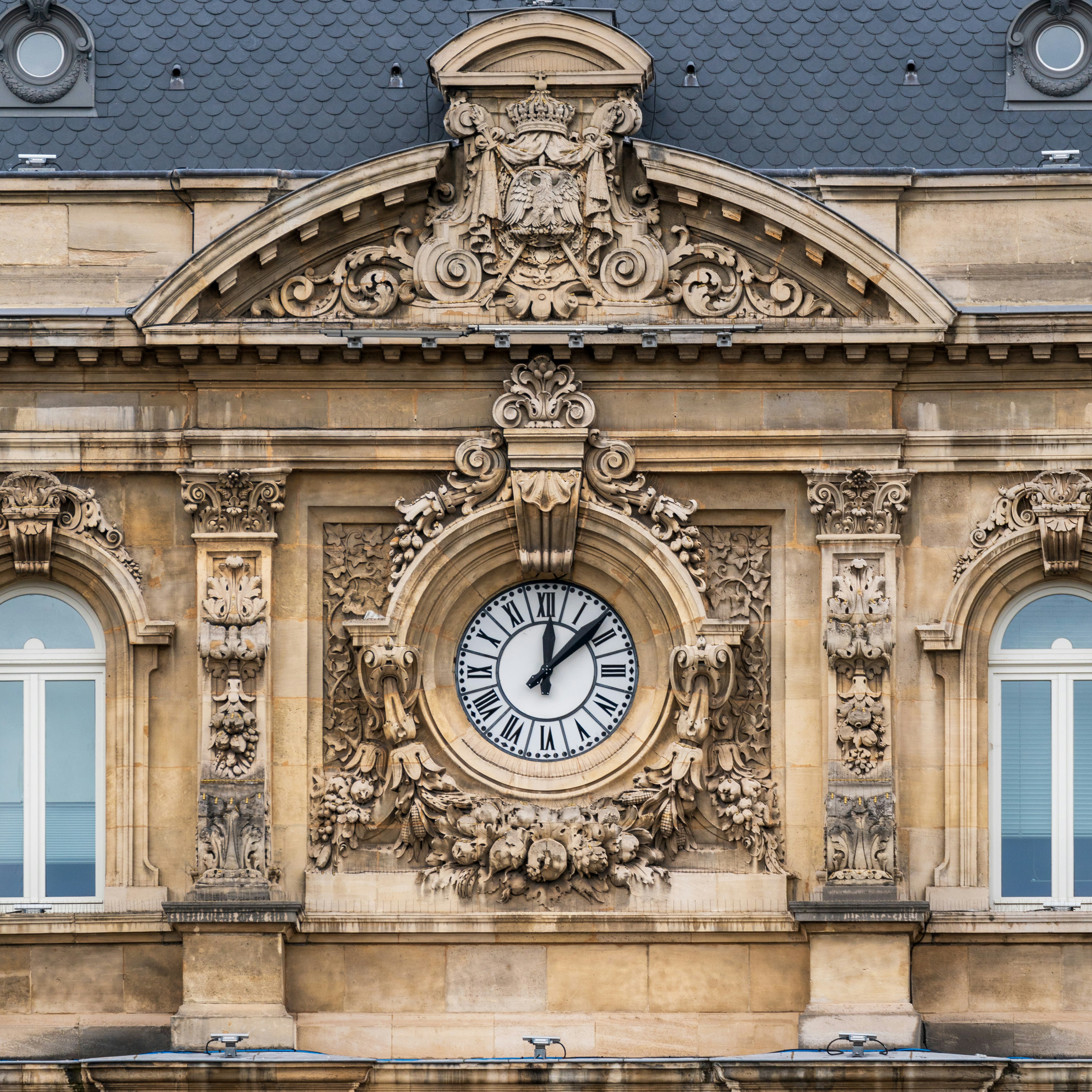 A large building with a clock on the front of it photo – Free Lille ...