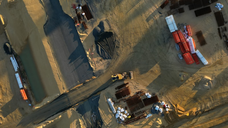 Aerial view of construction site with heavy equipment
