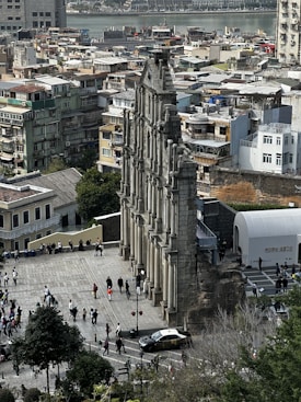 A large clock tower towering over a city