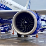 A large jetliner sitting on top of an airport tarmac