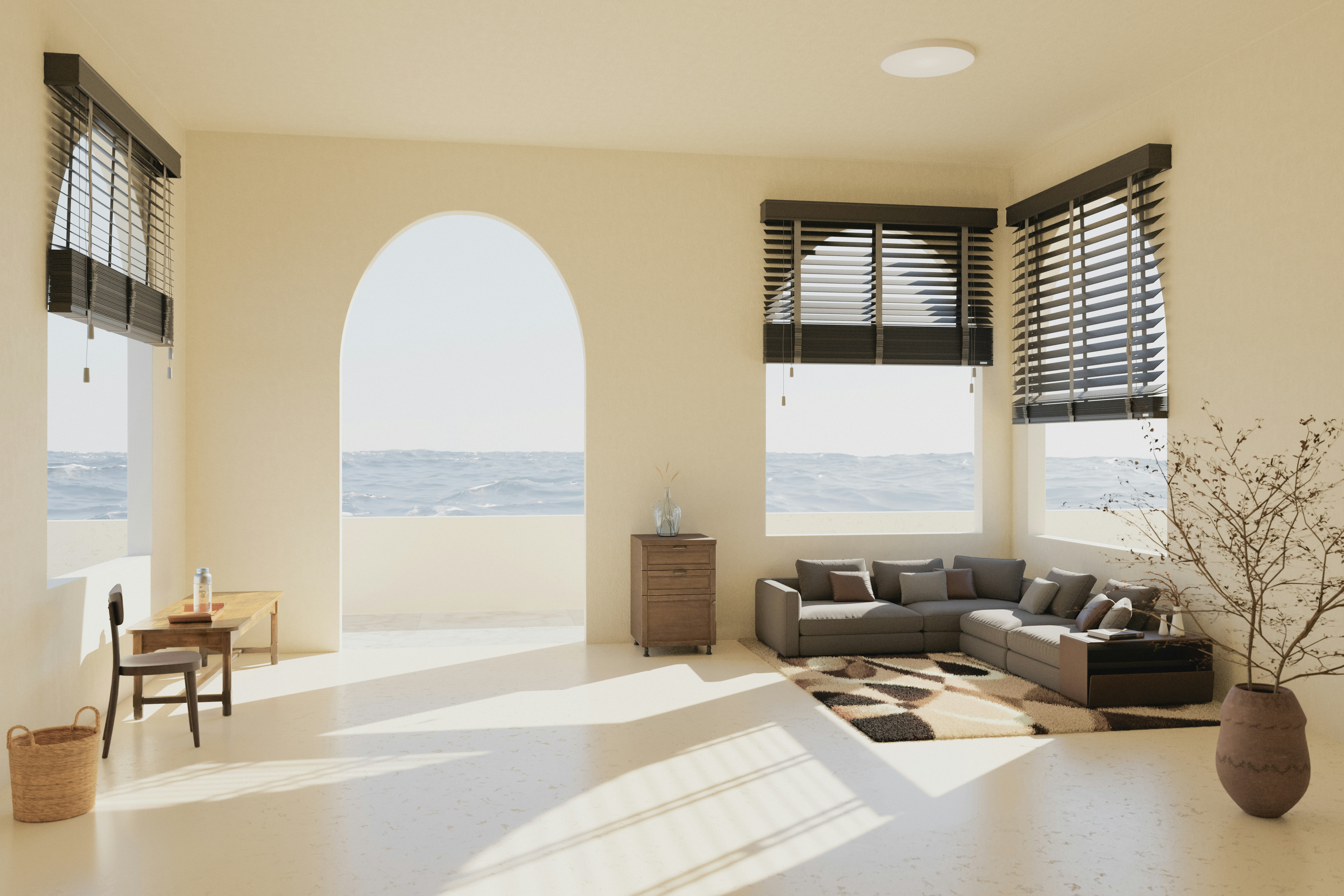 A living room filled with furniture and large windows