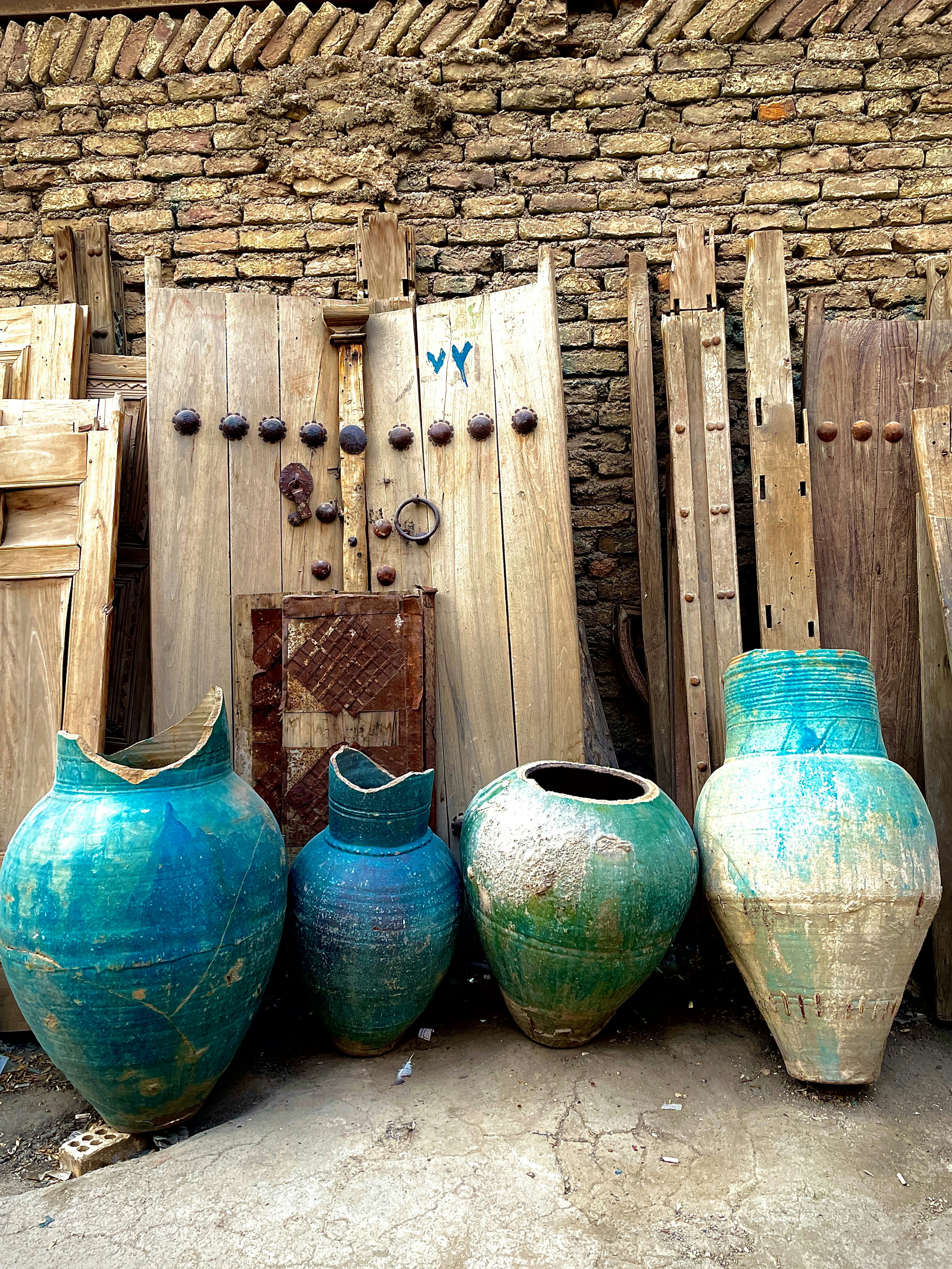 A group of vases sitting next to each other