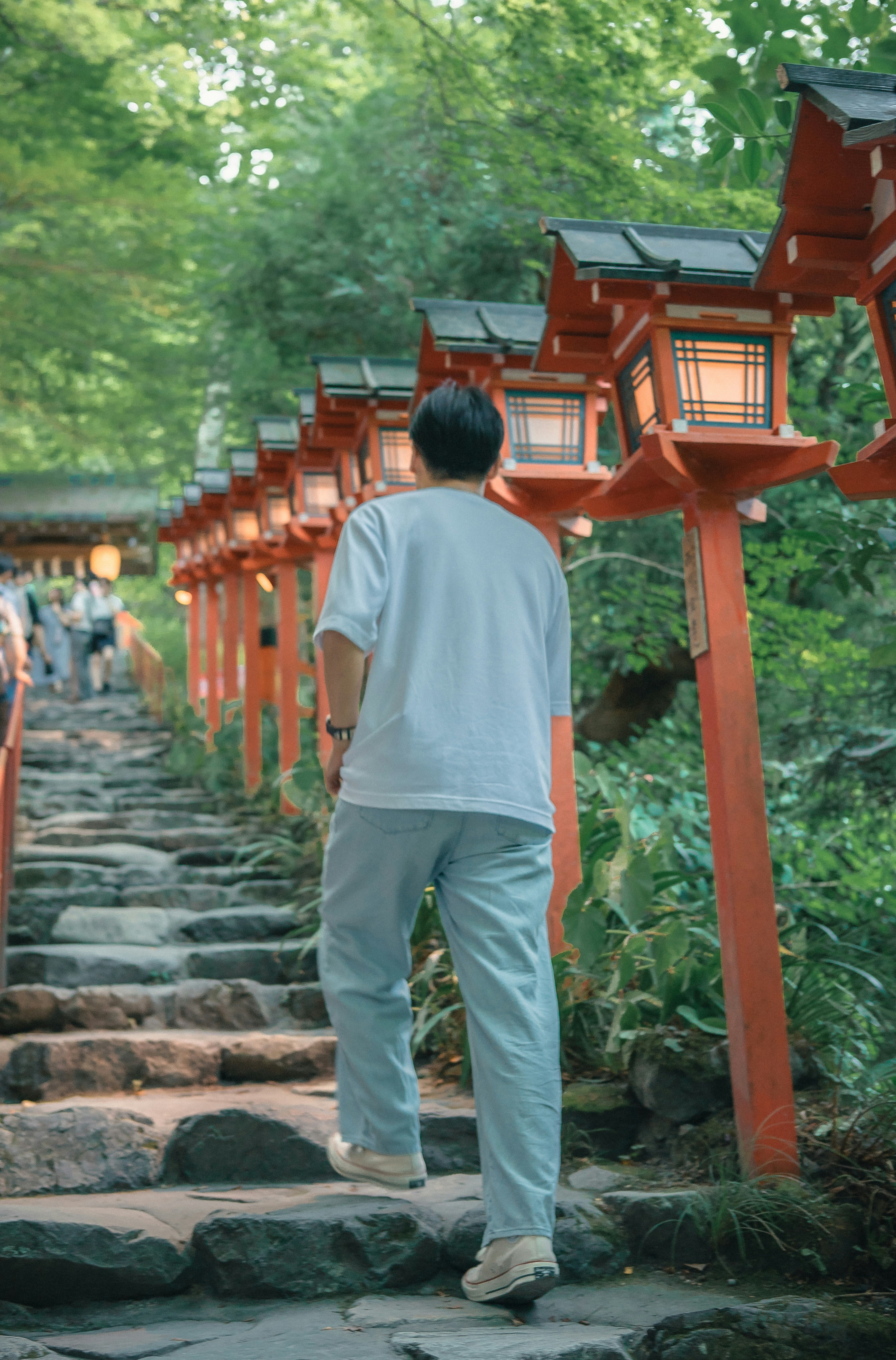 A man is walking up a set of stairs