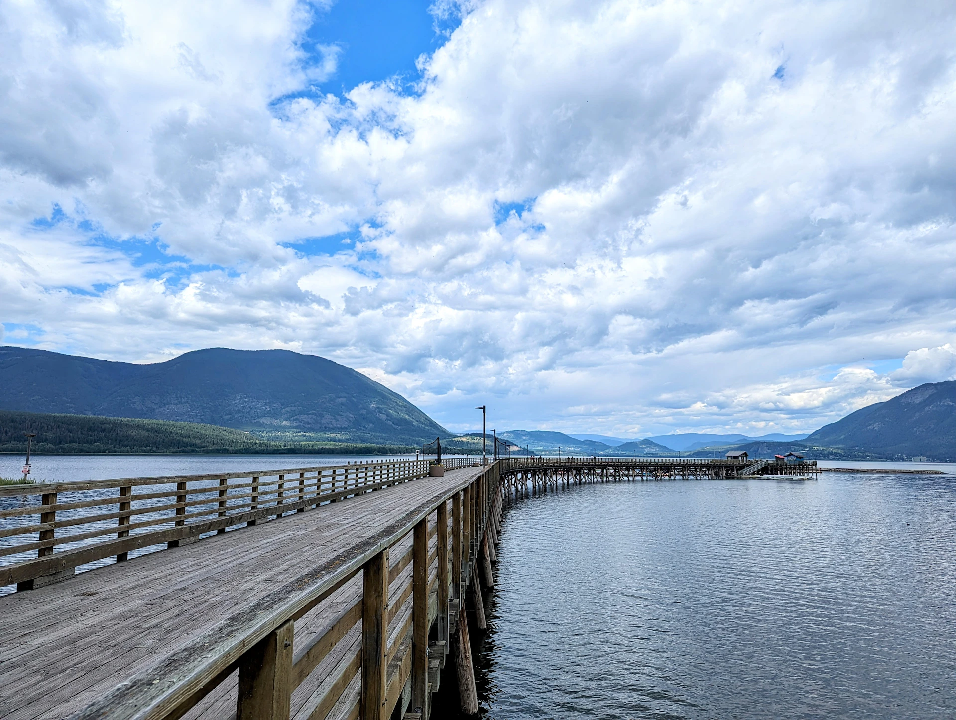 A long wooden pier stretching out into the water